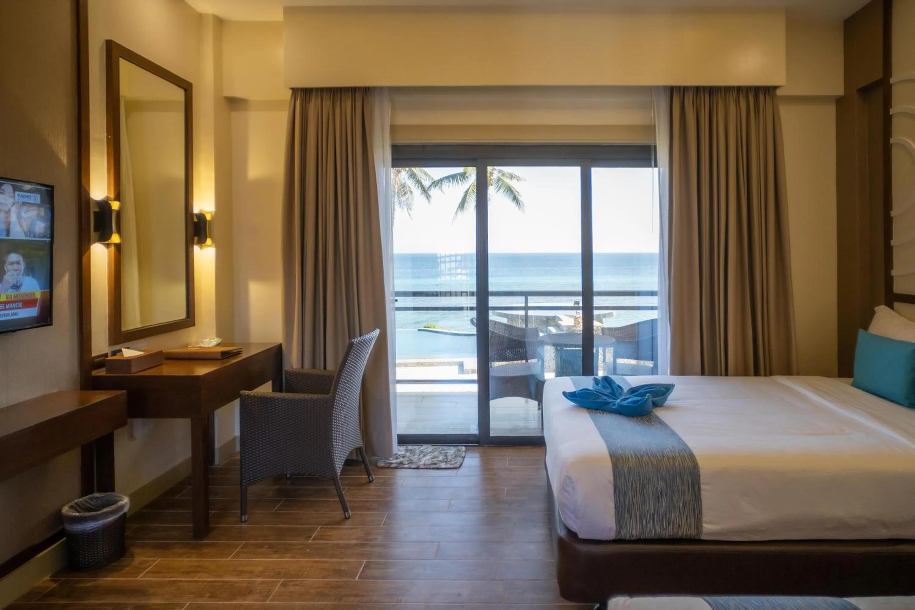 Bed in Parklane Bohol Resort and Spa