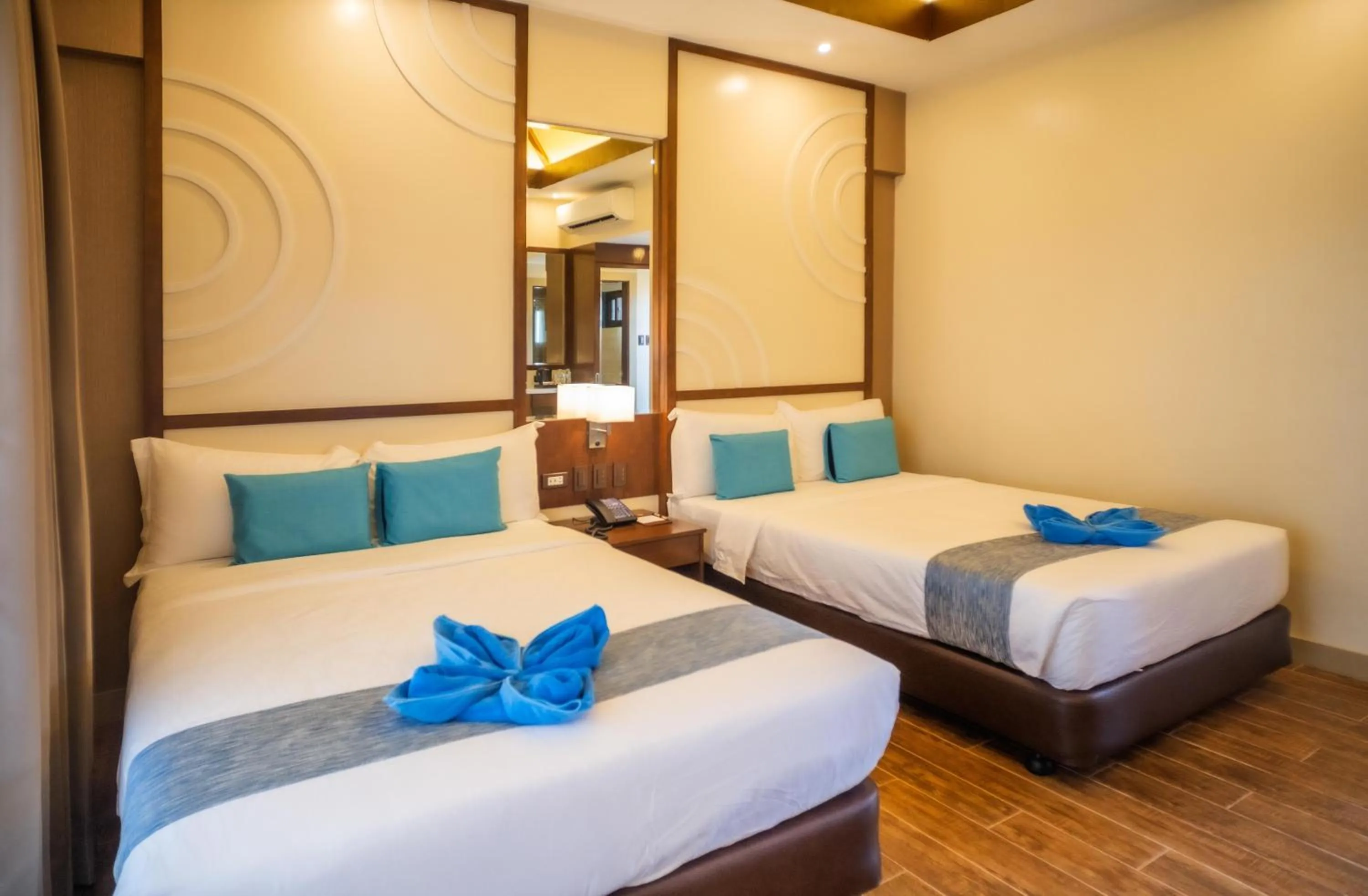 Bed in Parklane Bohol Resort and Spa