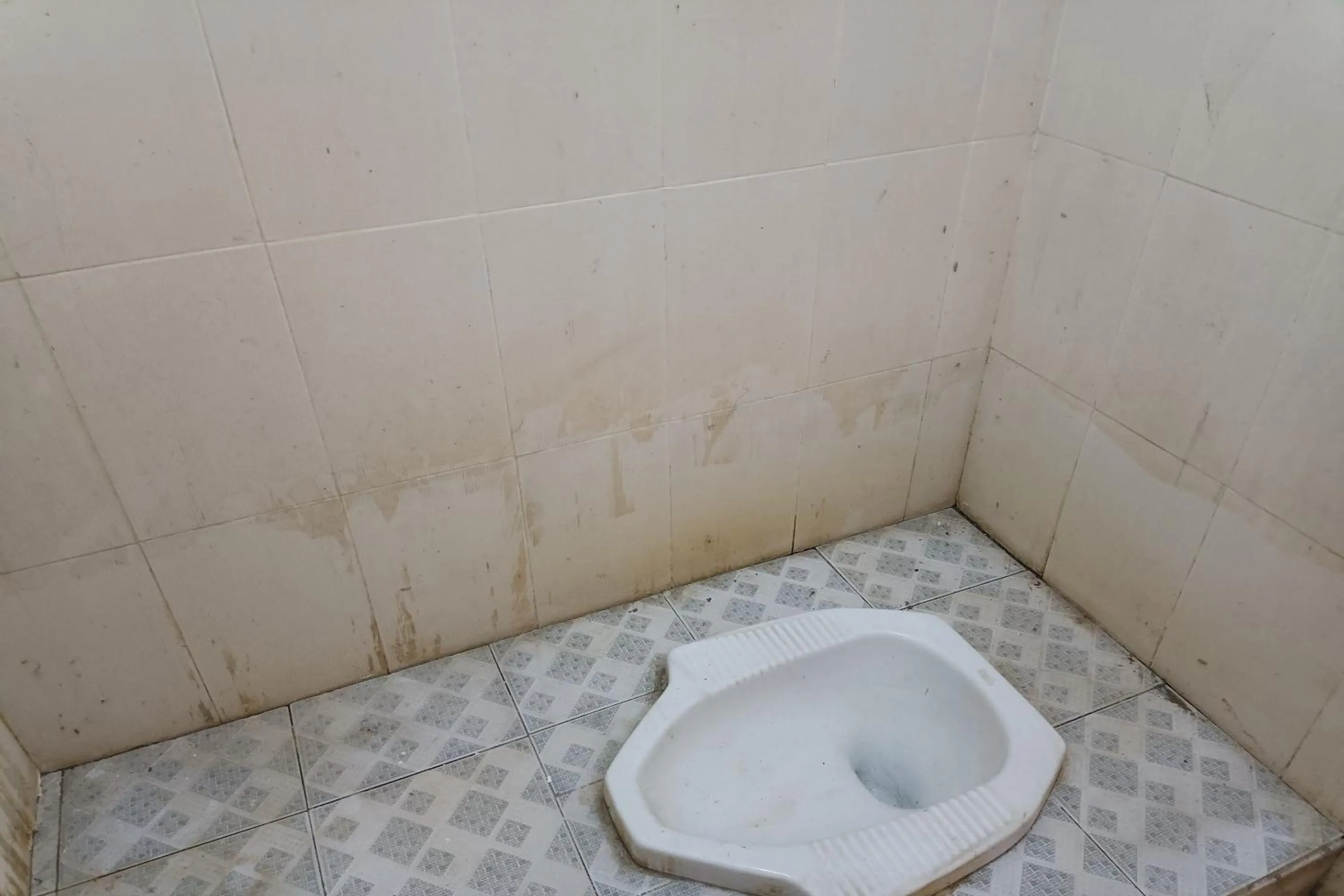 Bathroom in Hotel O Yuda Family Homestay Near Desa Wisata Hijau Bilebante