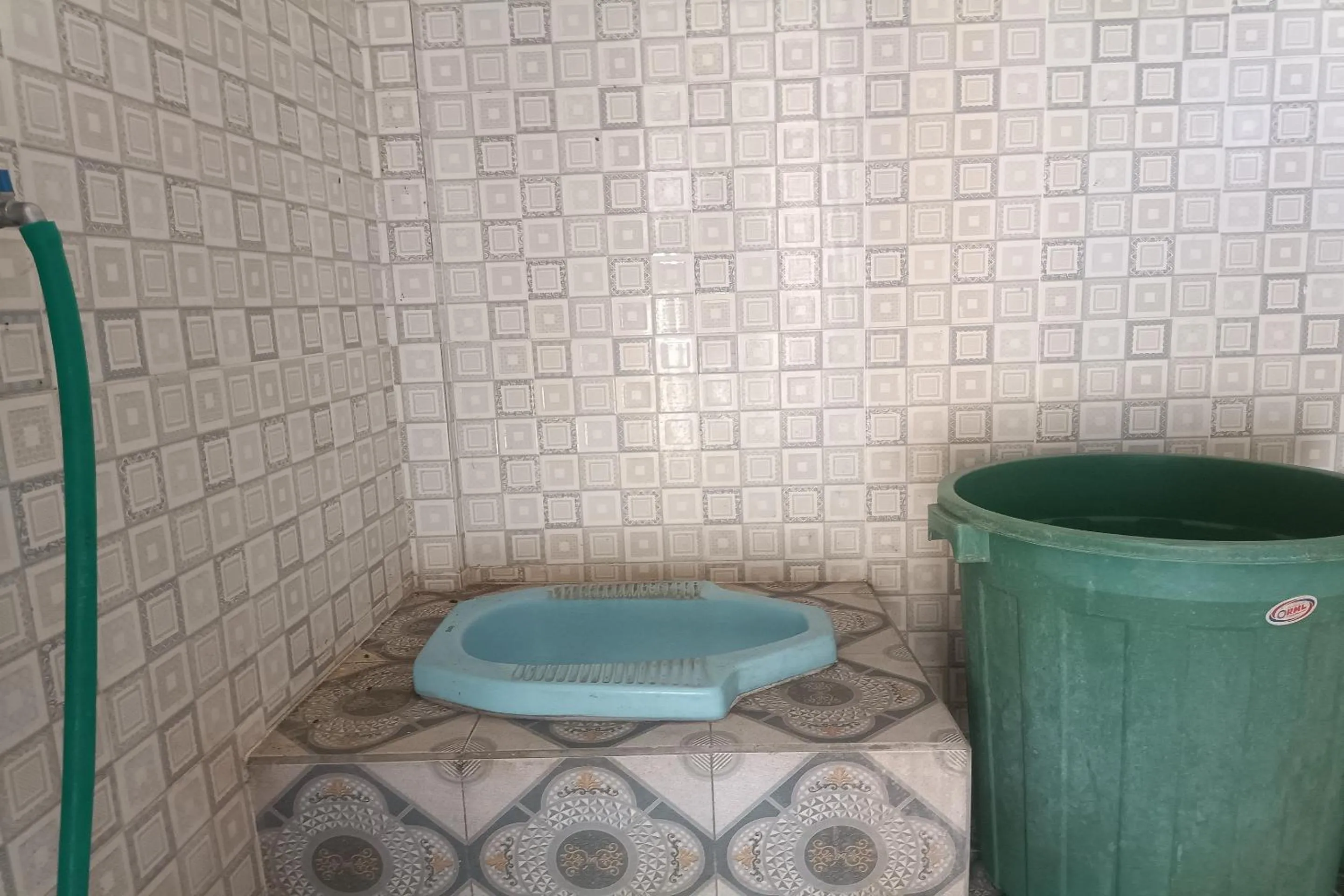 Bathroom in Hotel O Yuda Family Homestay Near Desa Wisata Hijau Bilebante