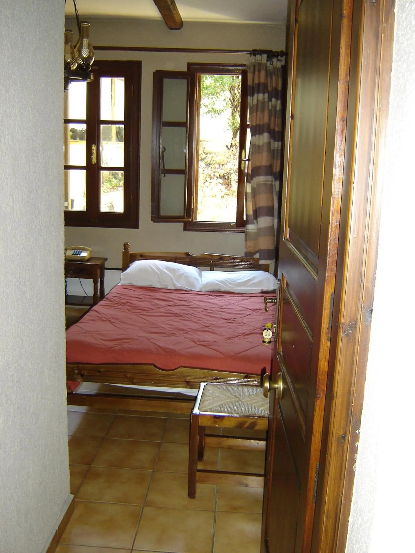 Bed in Rigas Hotel Arachova