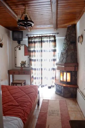 Bed in Rigas Hotel Arachova