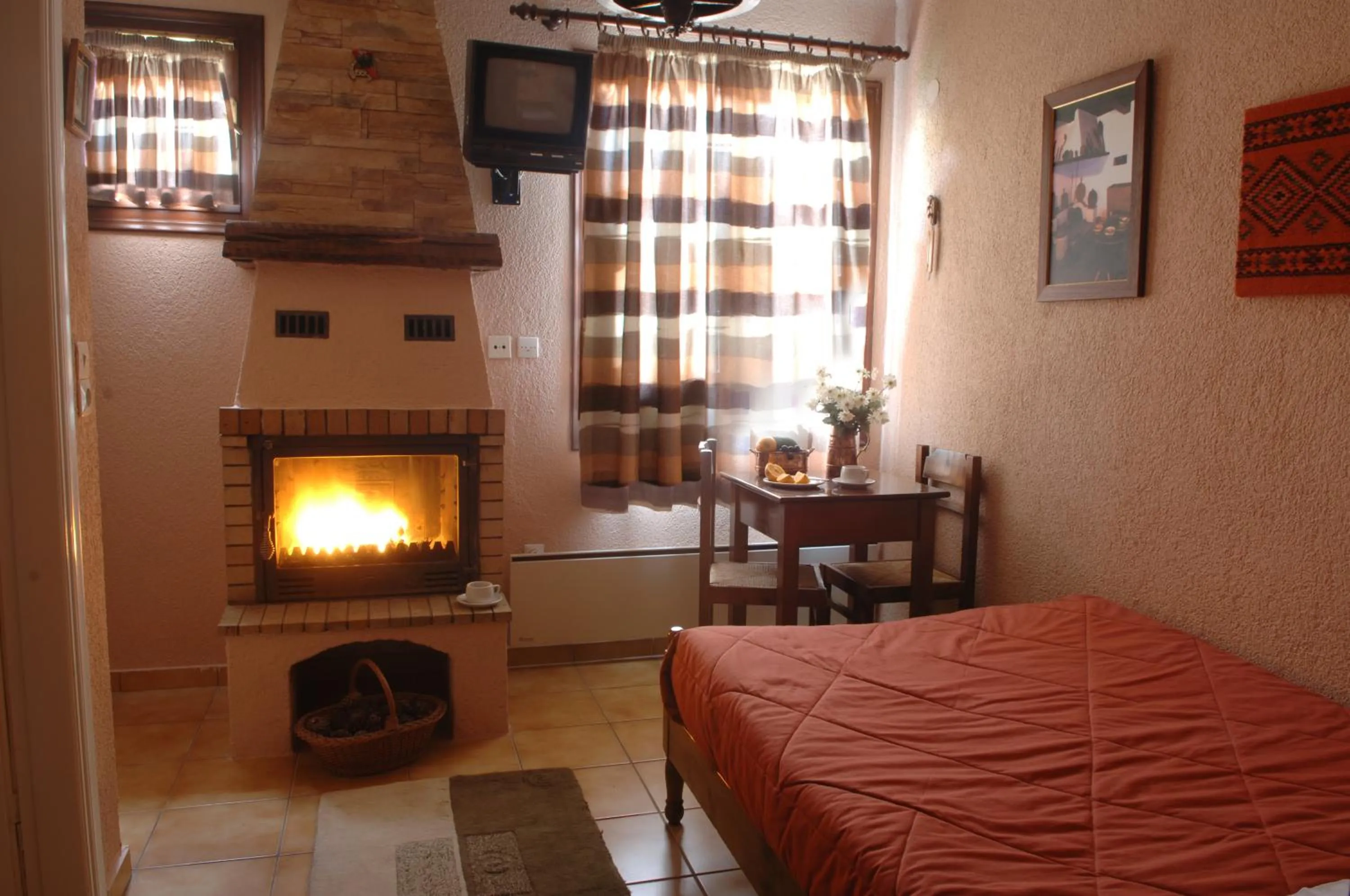 Bed in Rigas Hotel Arachova