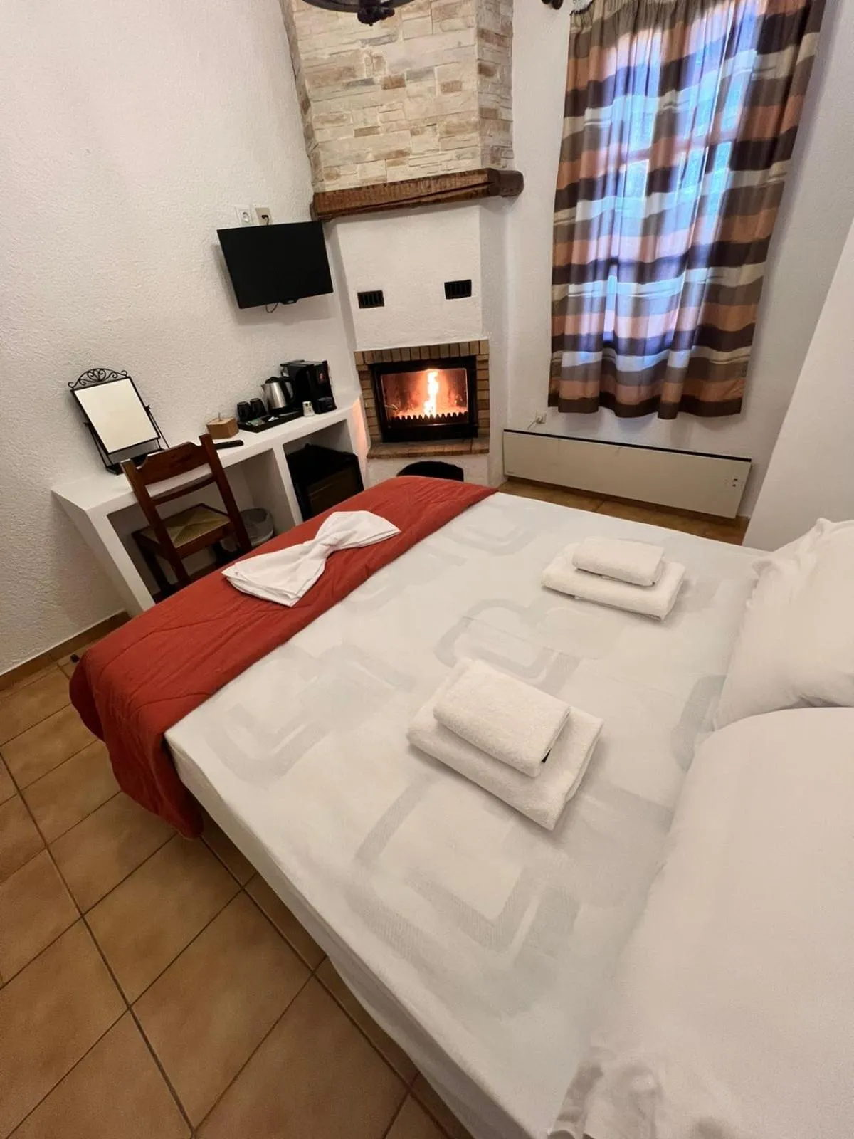 Bed in Rigas Hotel Arachova