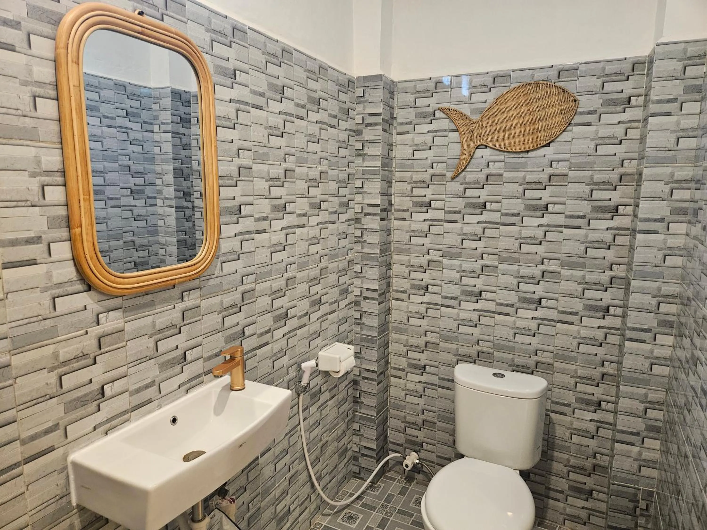 Shower in Risna Homestay