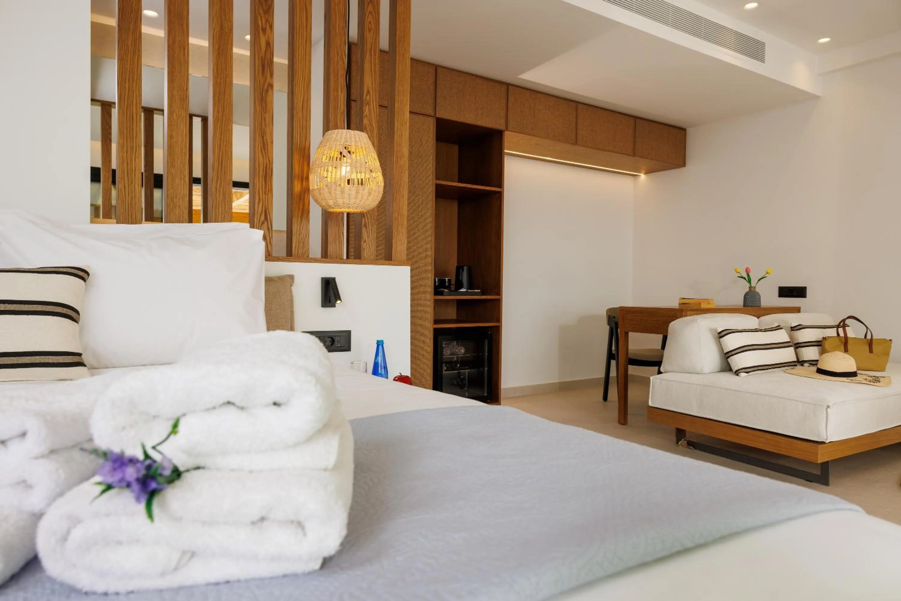 Bed in Deos Luxury Suites - Adults Only