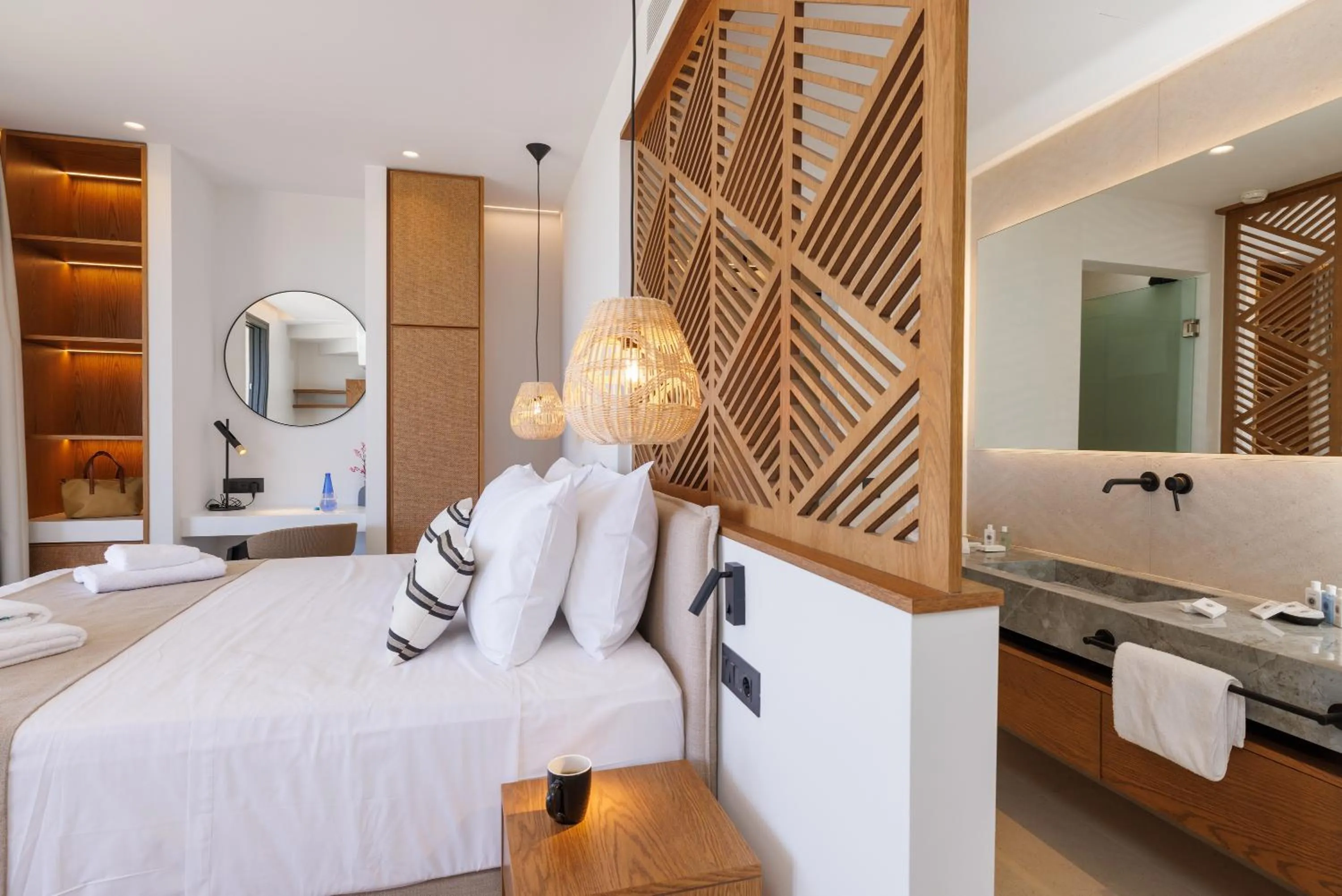 Bed in Deos Luxury Suites - Adults Only