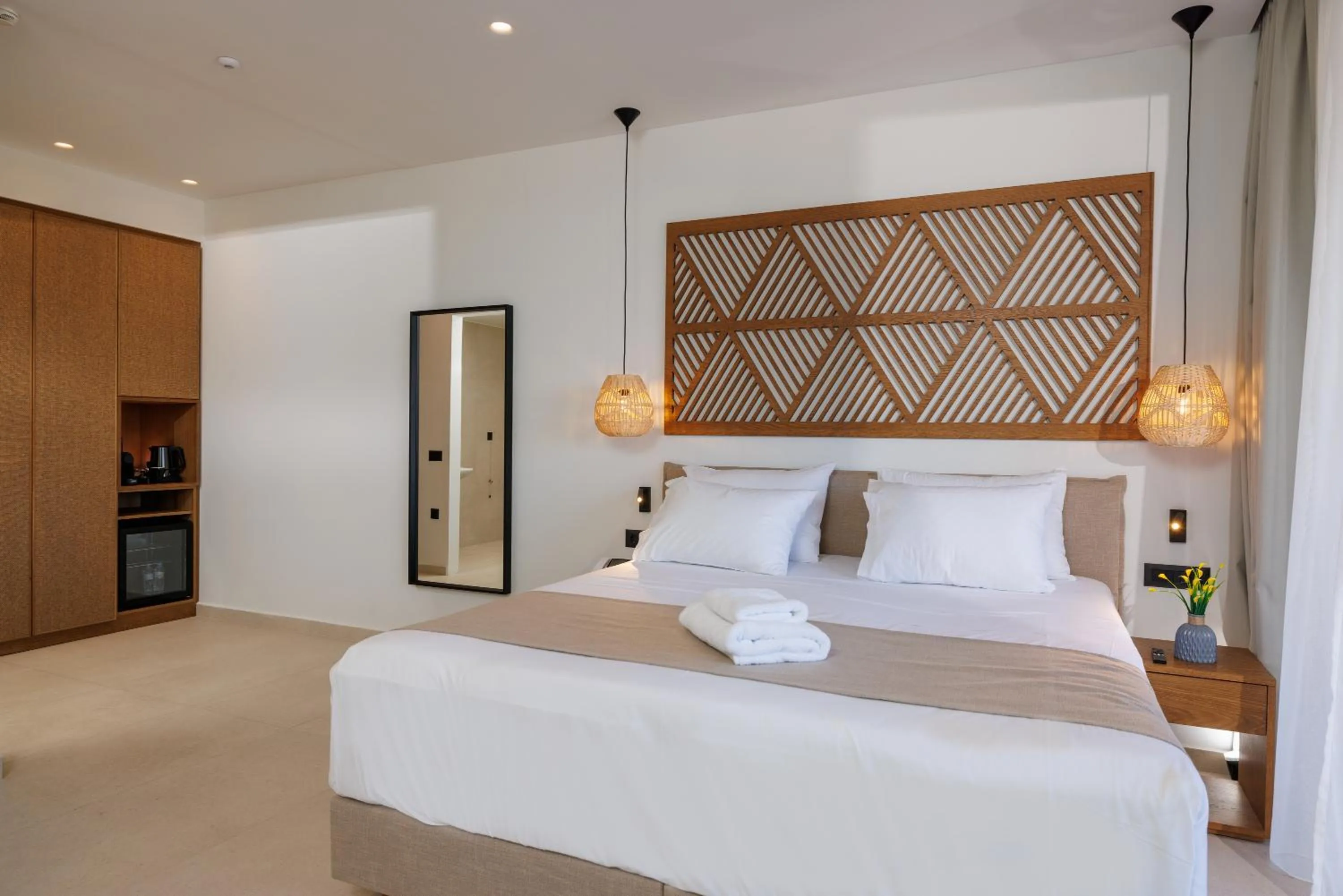 Bed in Deos Luxury Suites - Adults Only