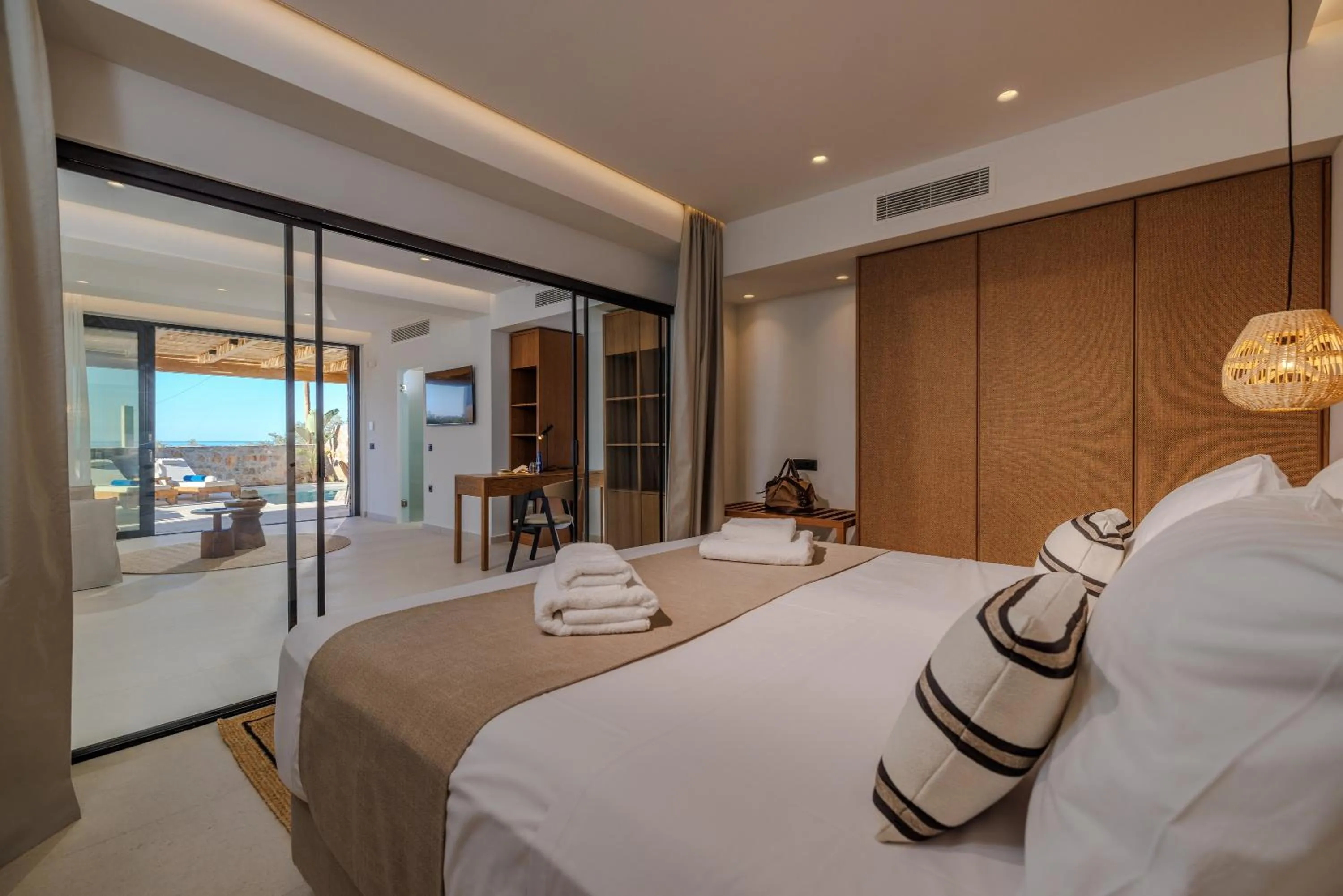 Bed in Deos Luxury Suites - Adults Only