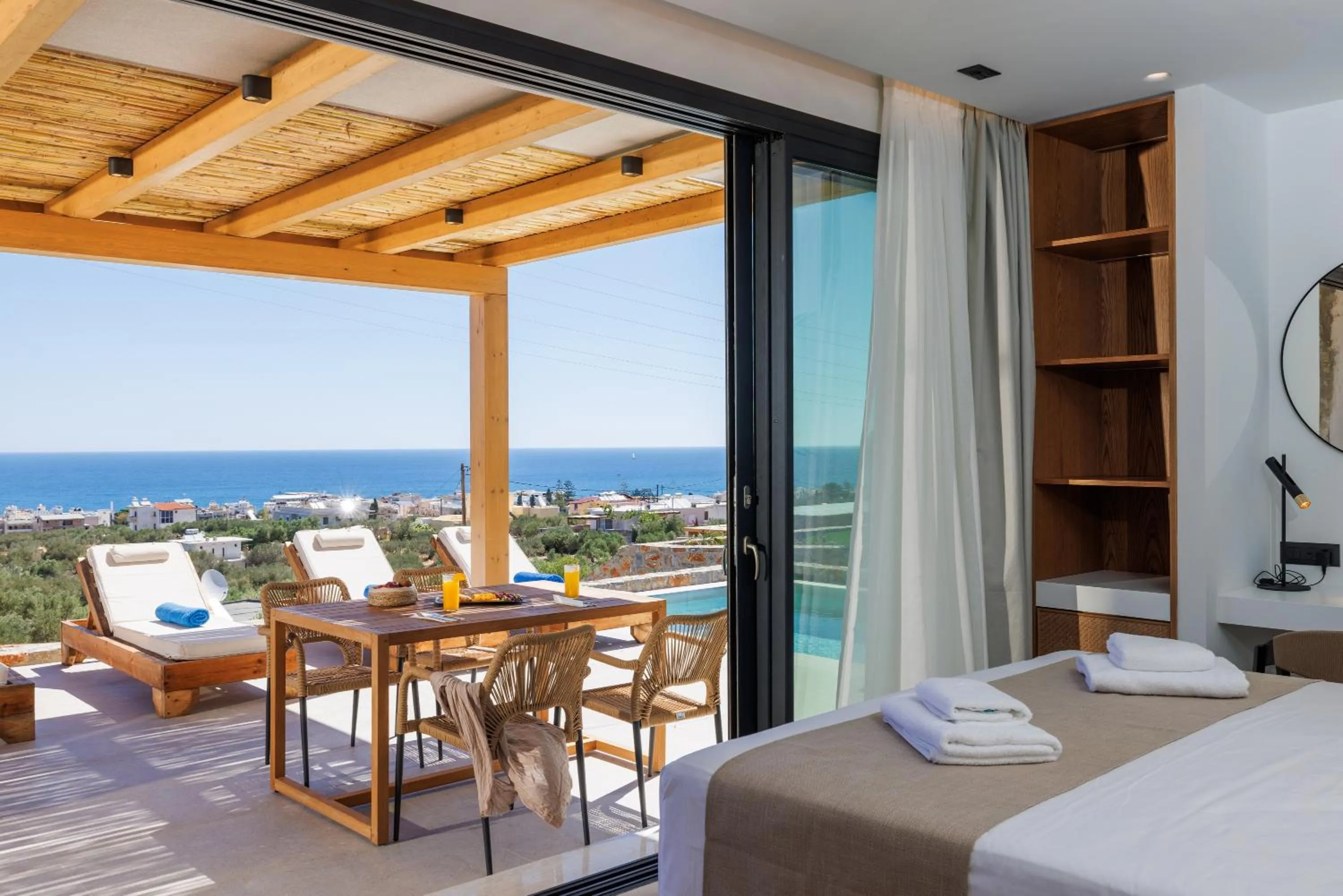 Bed in Deos Luxury Suites - Adults Only