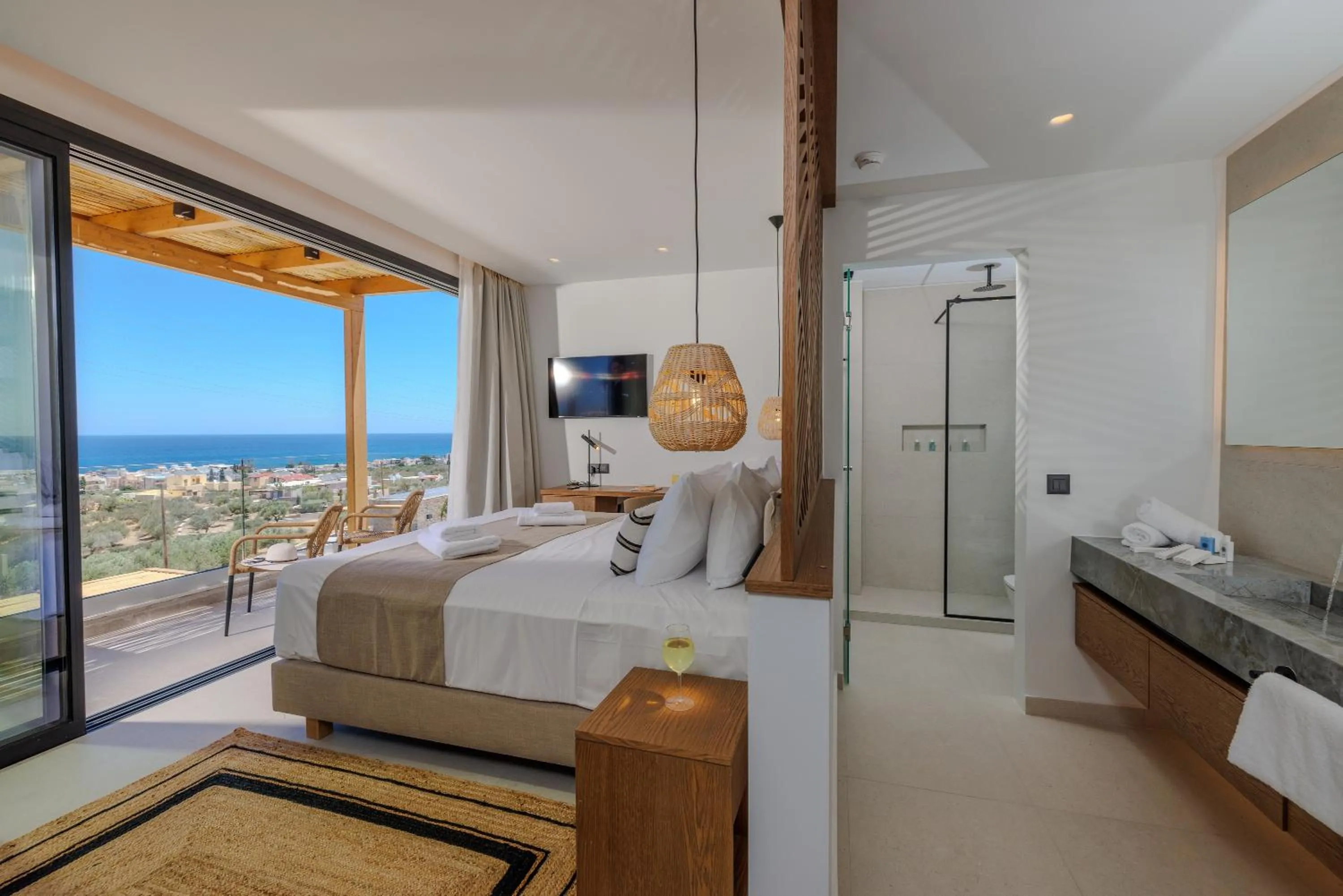 Bed in Deos Luxury Suites - Adults Only