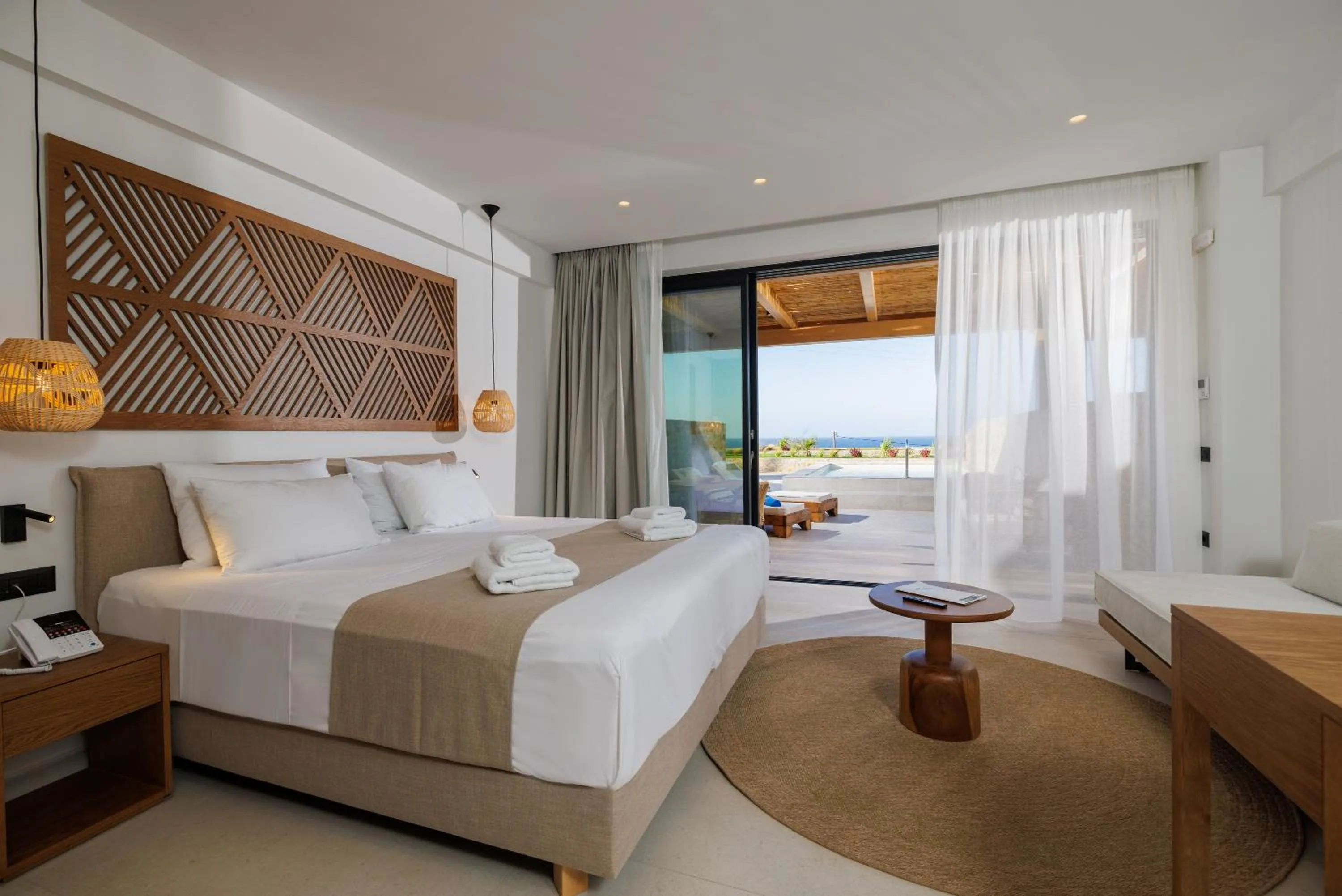 Bed in Deos Luxury Suites - Adults Only