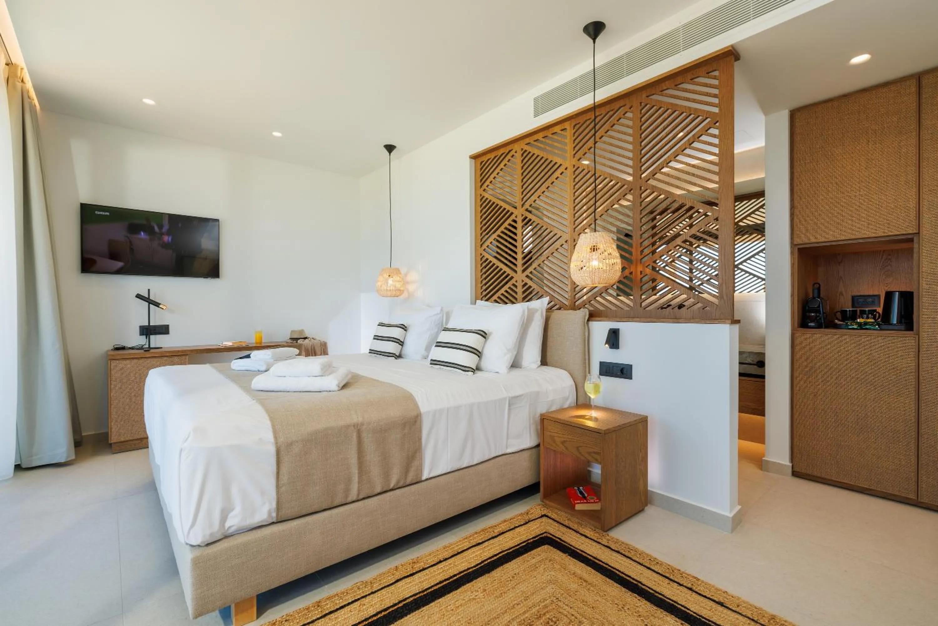 Bed in Deos Luxury Suites - Adults Only