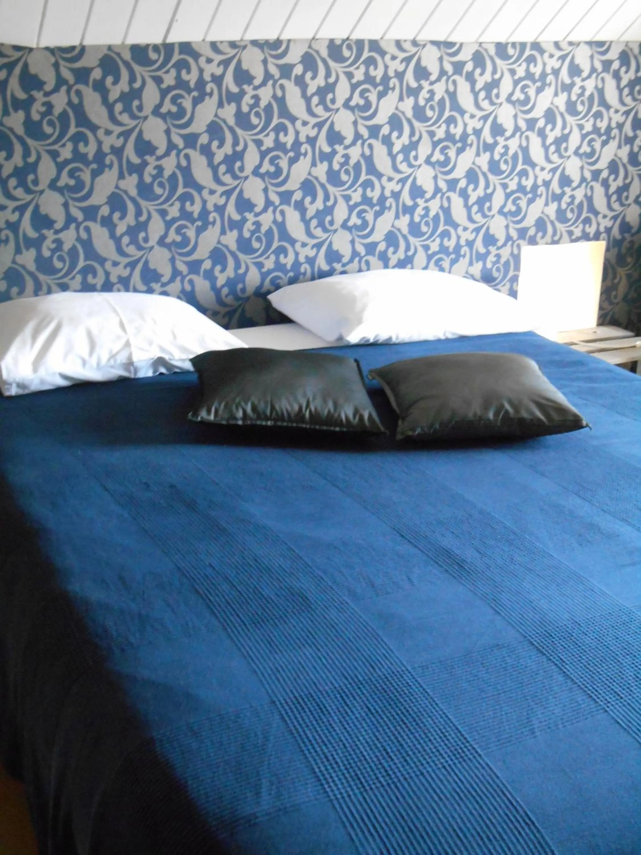 Bed in B&B A l'Ombre du Tilleul