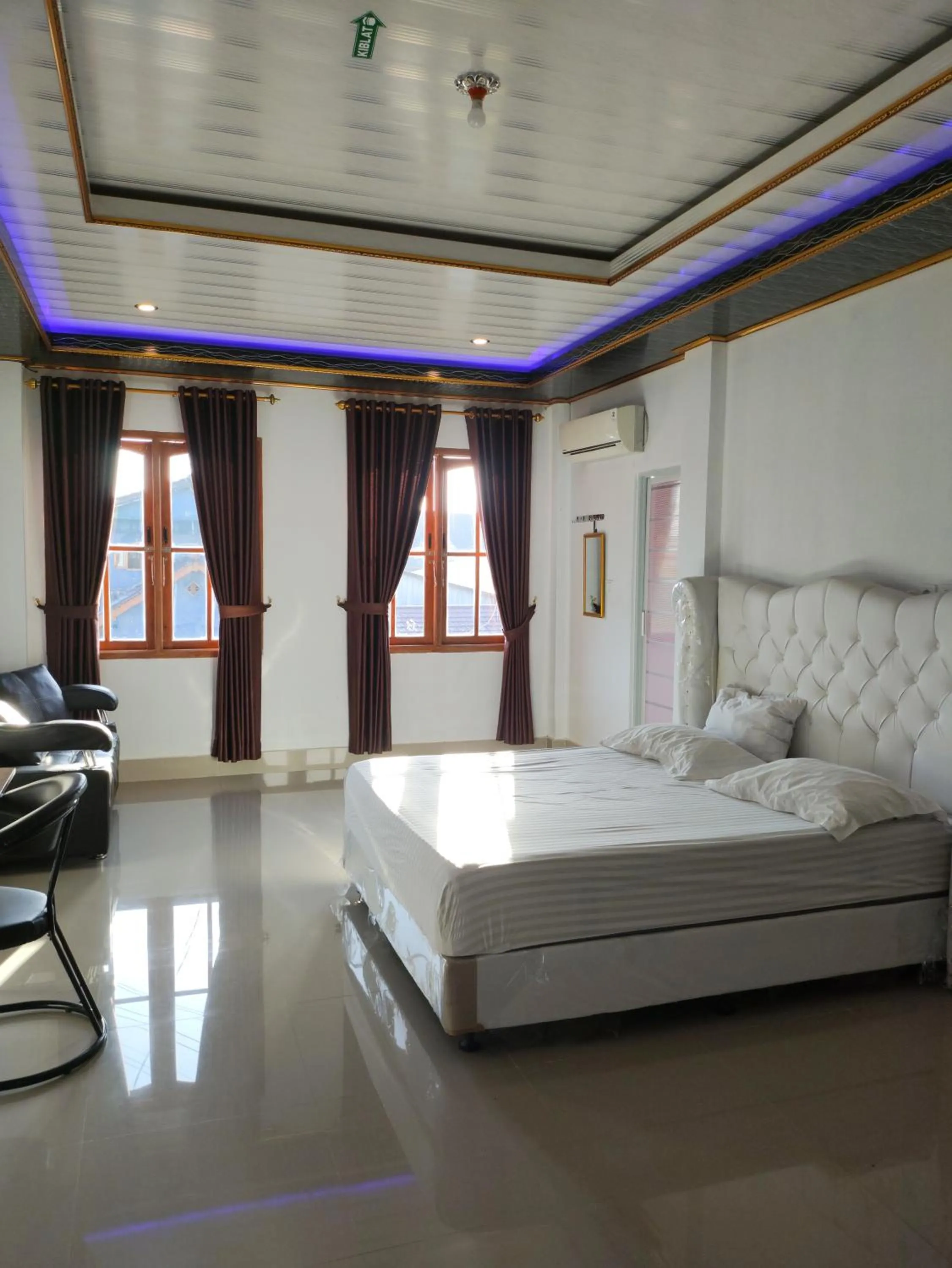 Bed in Penginapan Nurmega jaya