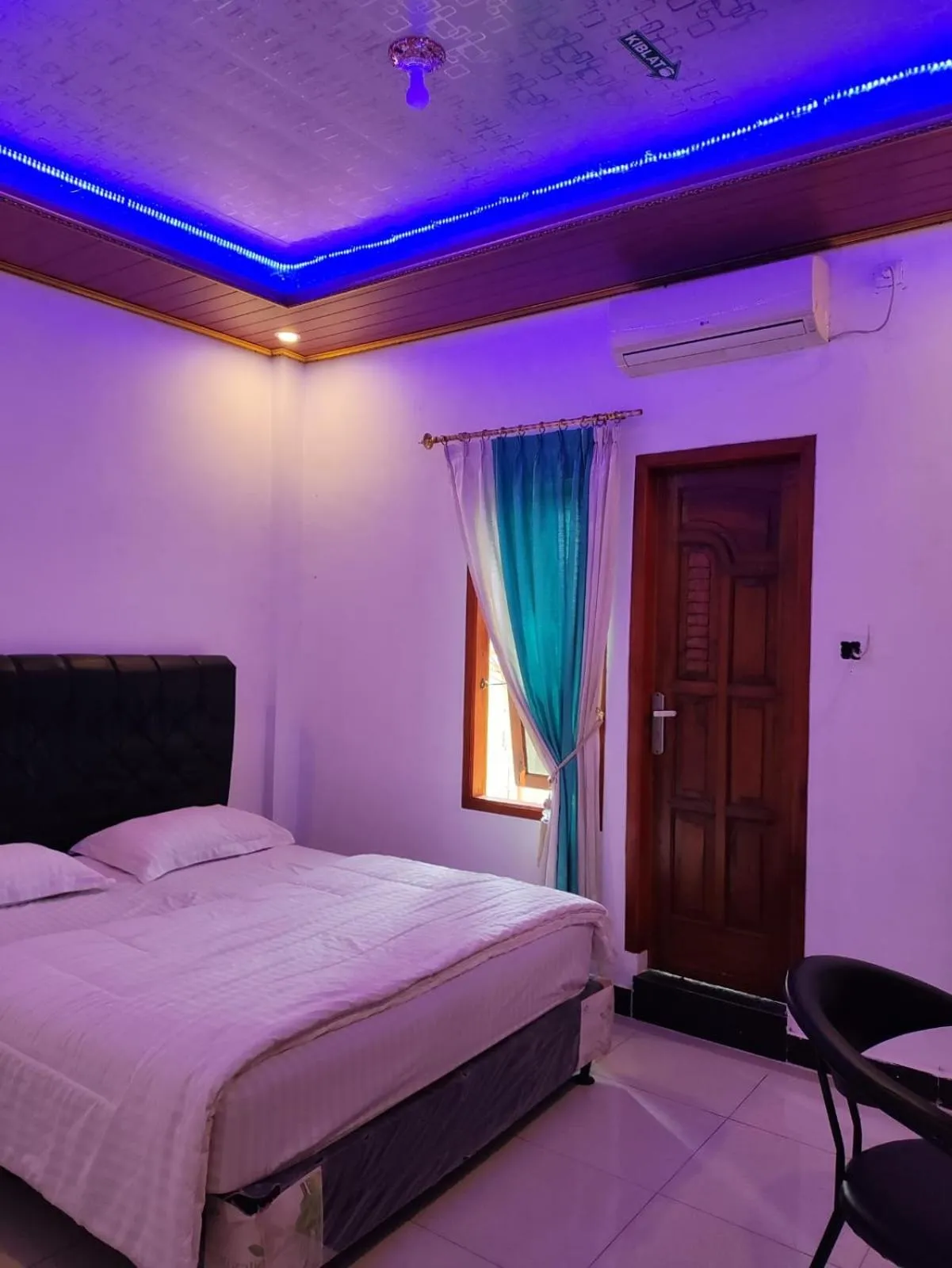 Bed in Penginapan Nurmega jaya