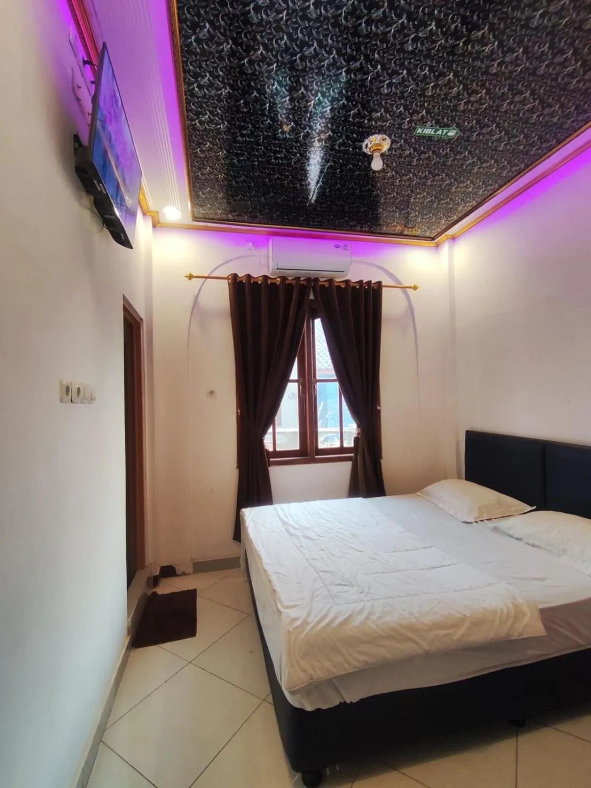 Bed in Penginapan Nurmega jaya