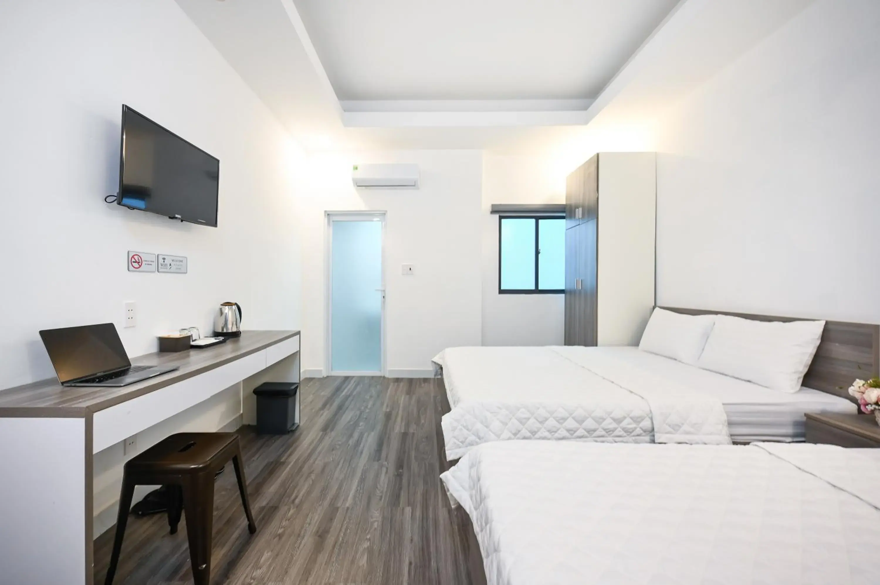 Superior Family Room in YoKo Airport Saigon Hotel Superior Family Room in YoKo Airport Saigon Hotel