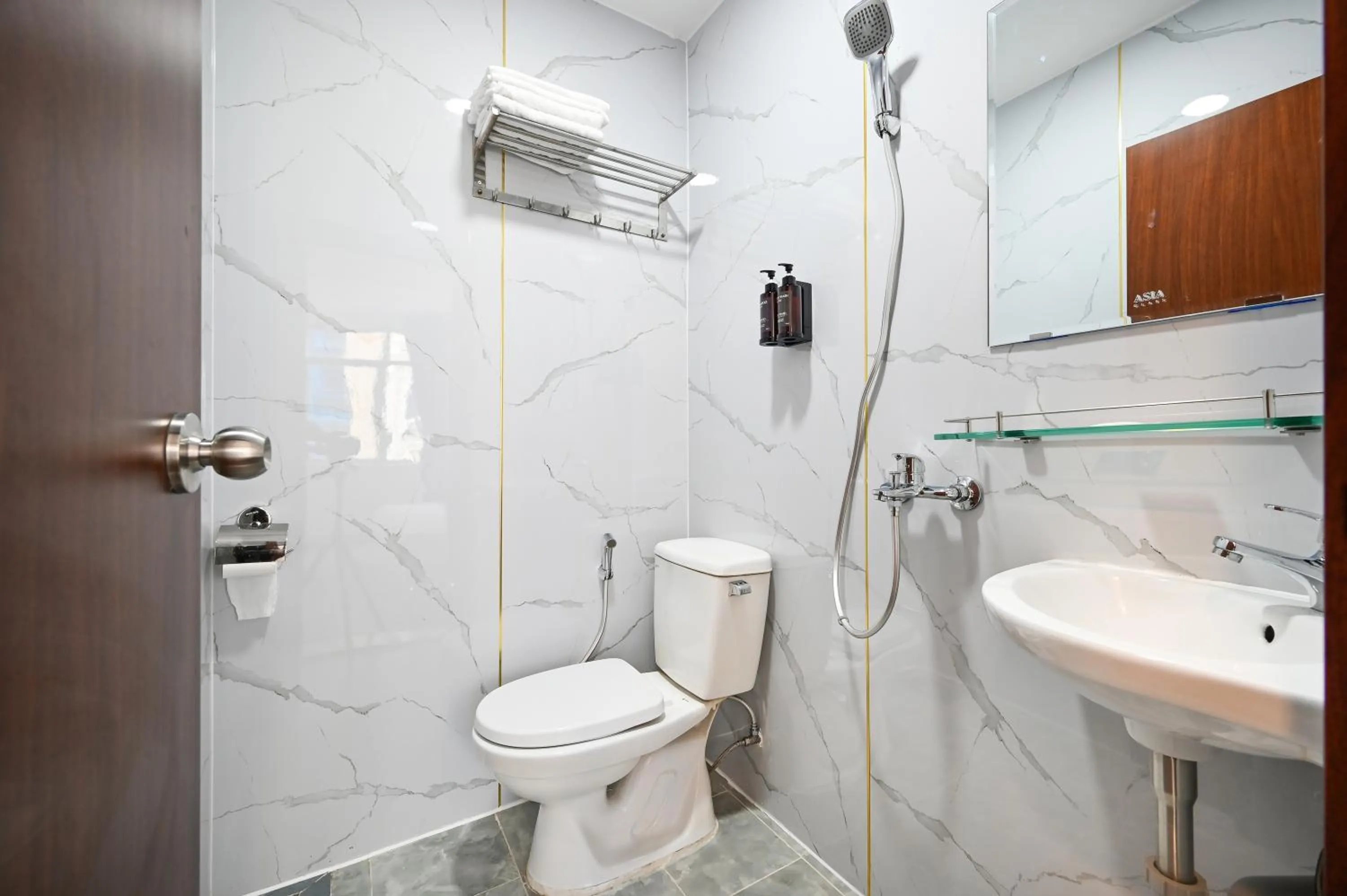 Shower in YoKo Airport Saigon Hotel