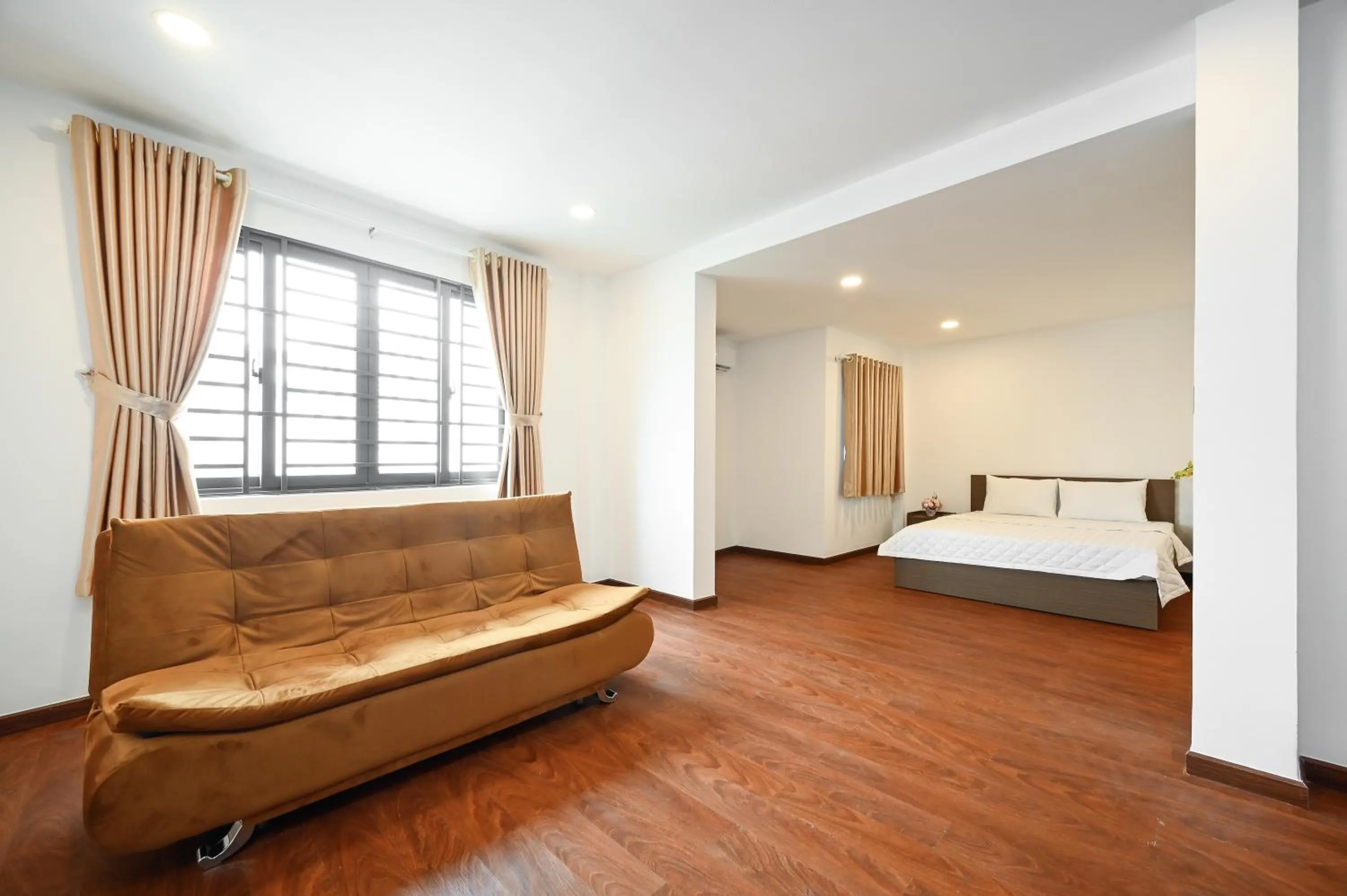 Bed in YoKo Airport Saigon Hotel