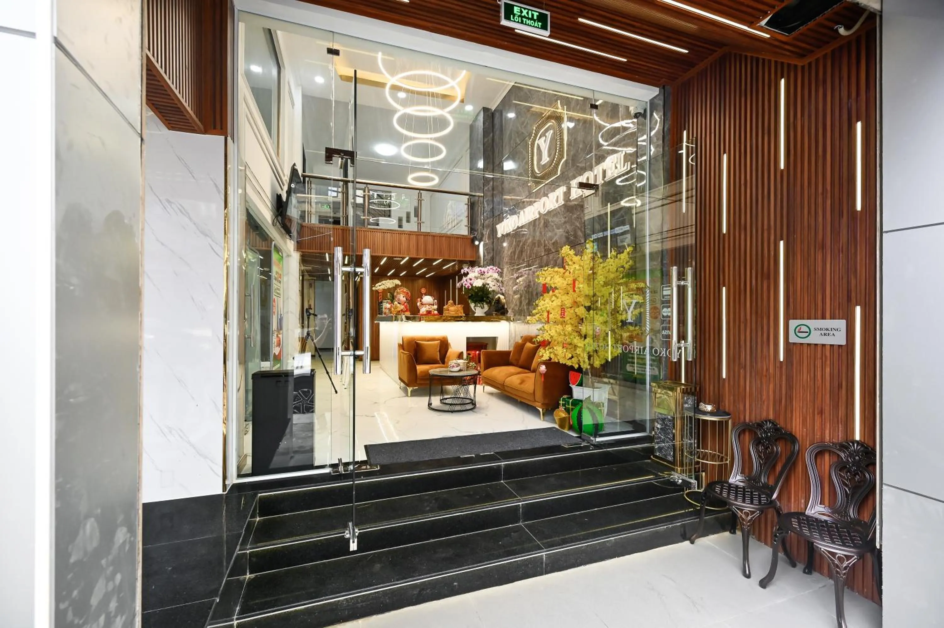 Seating area in YoKo Airport Saigon Hotel