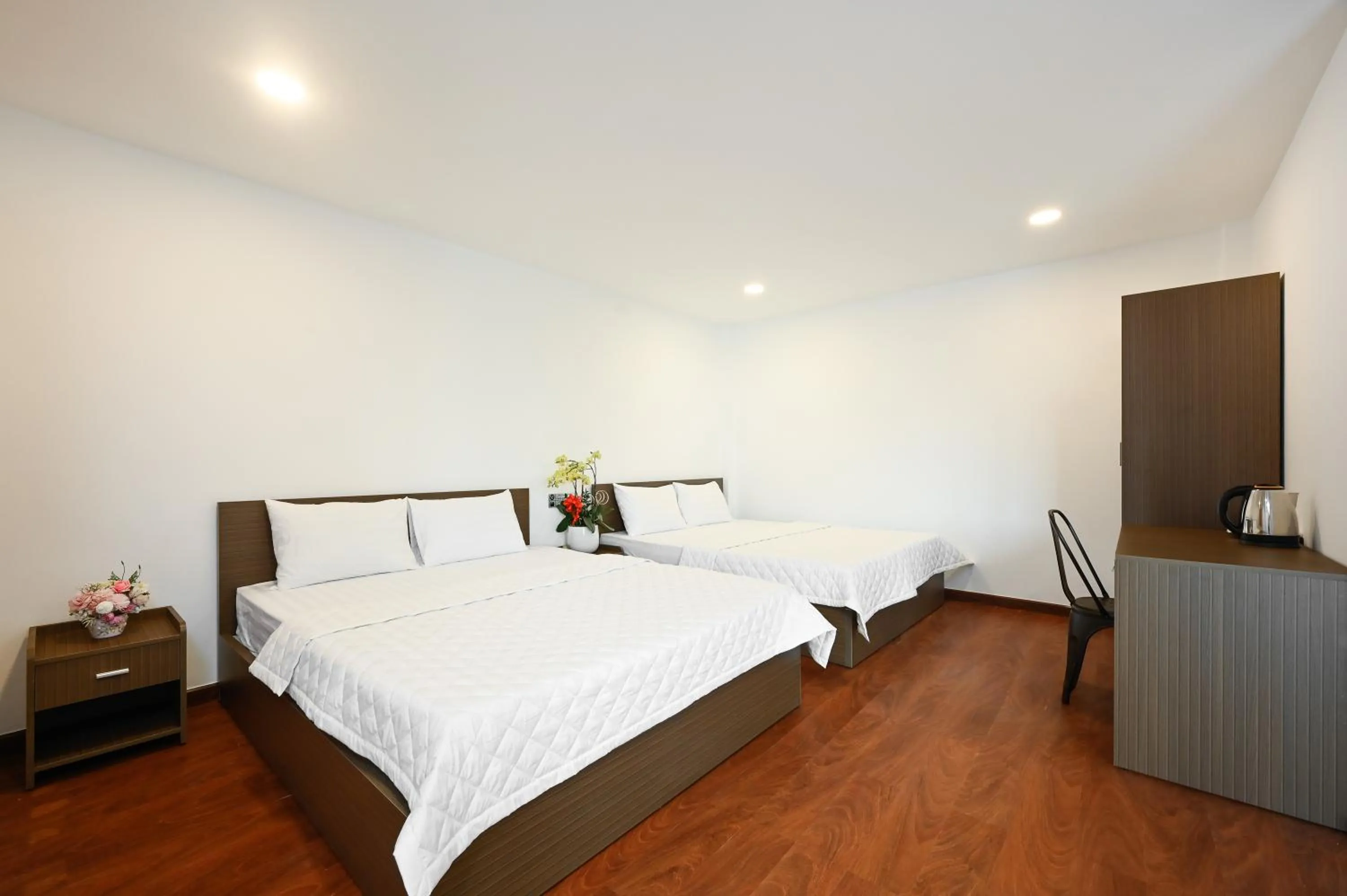 Bed in YoKo Airport Saigon Hotel