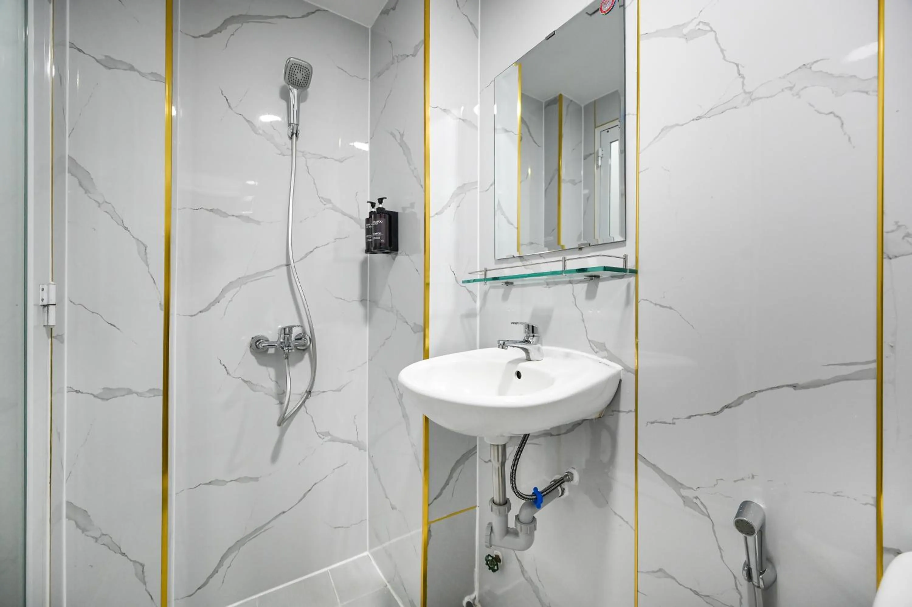 Bathroom in YoKo Airport Saigon Hotel