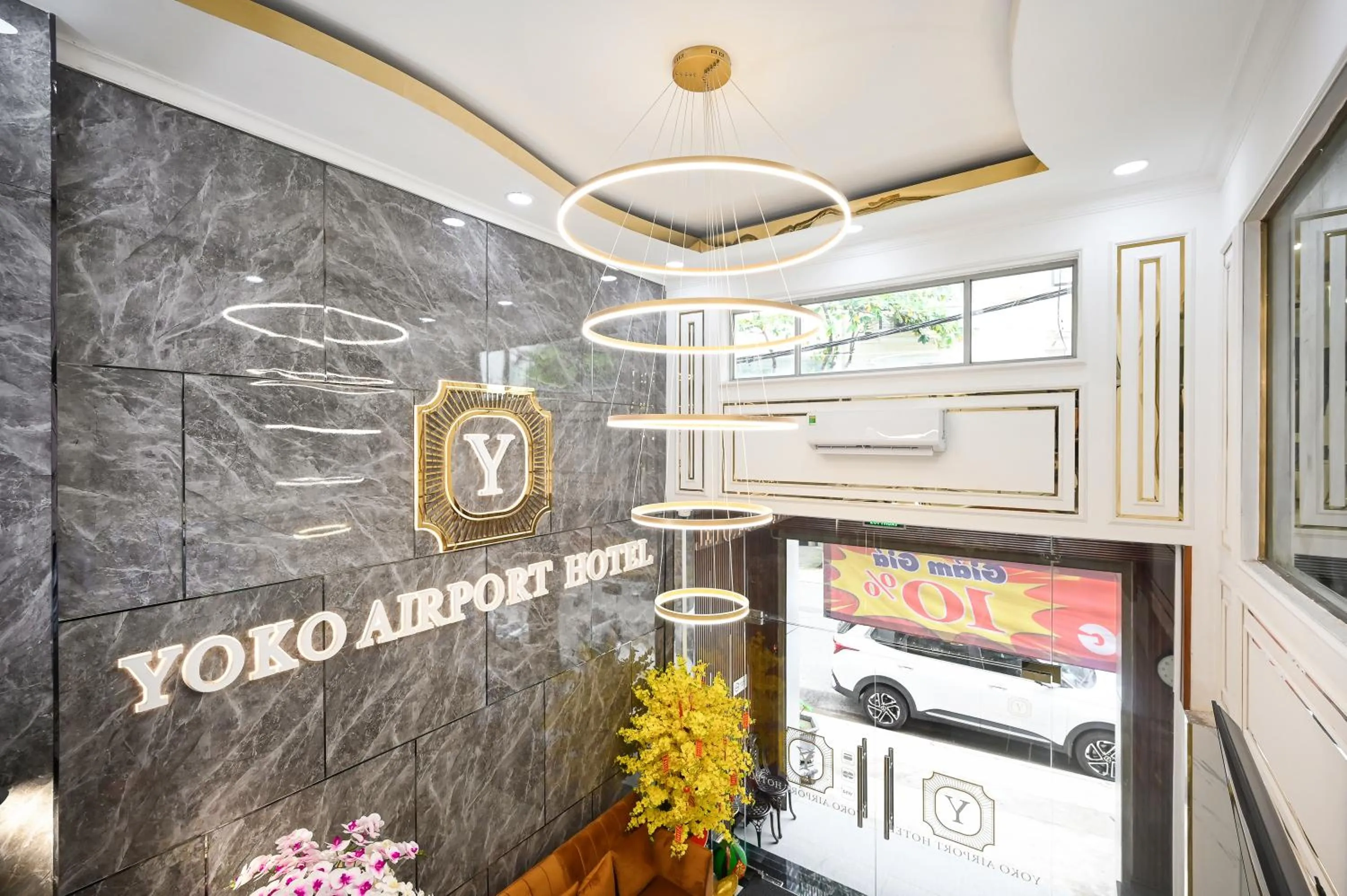 Property logo or sign in YoKo Airport Saigon Hotel