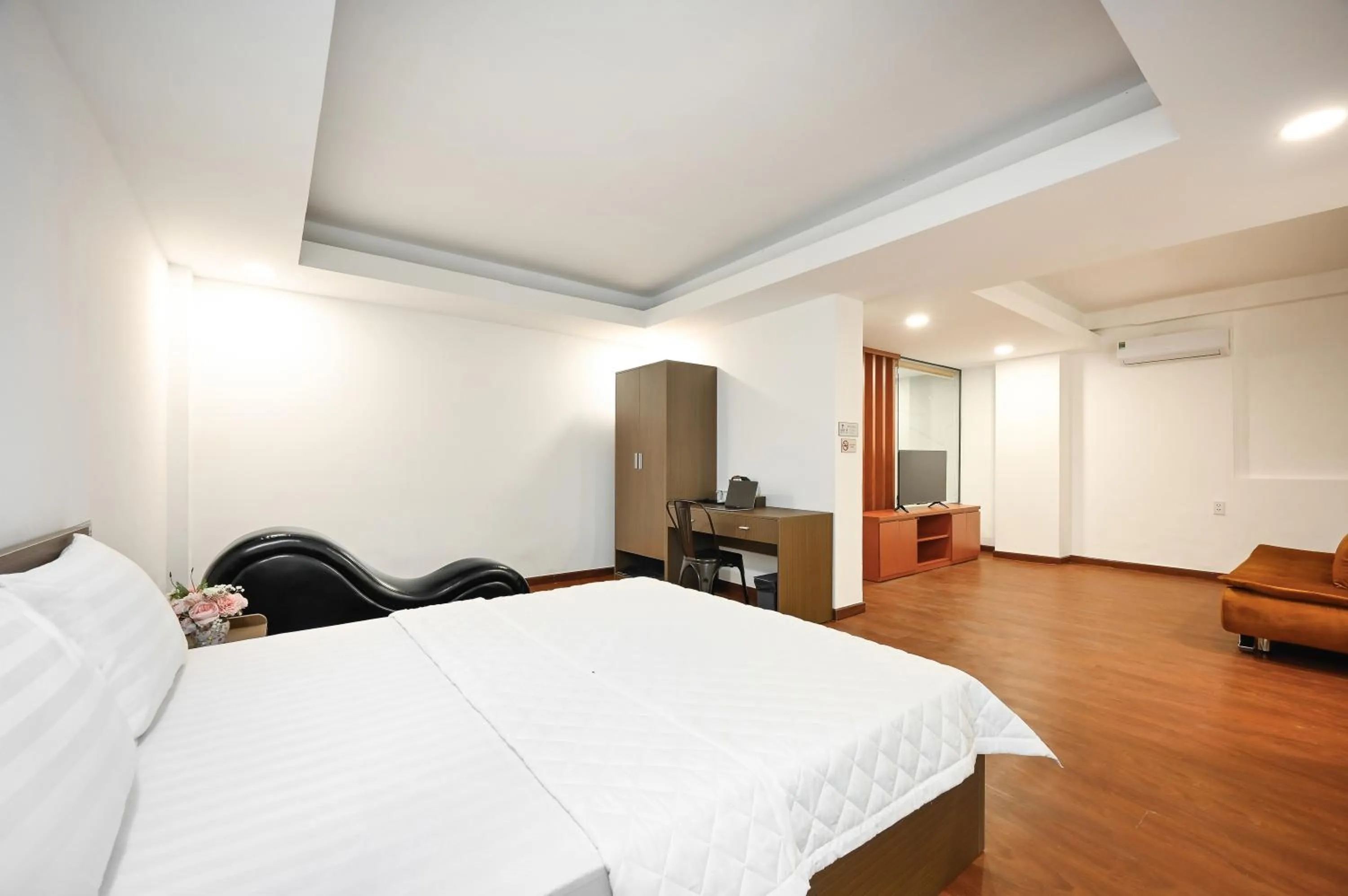 Photo of the whole room, Bed in YoKo Airport Saigon Hotel