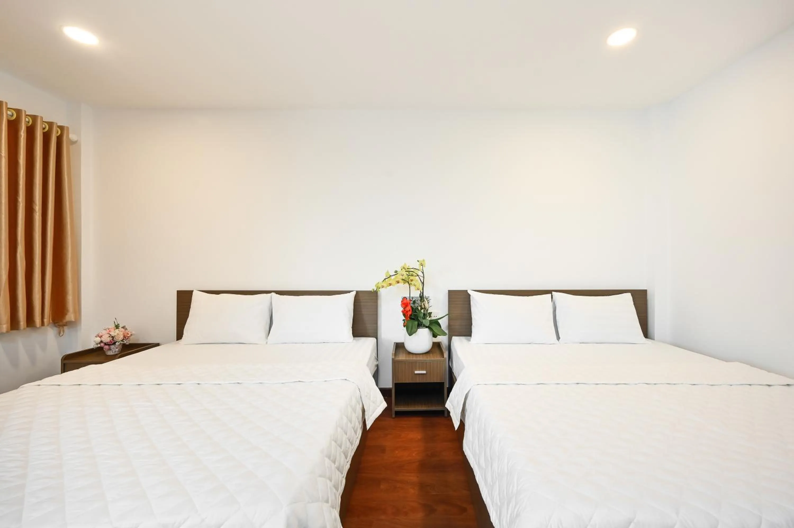 Bed in YoKo Airport Saigon Hotel