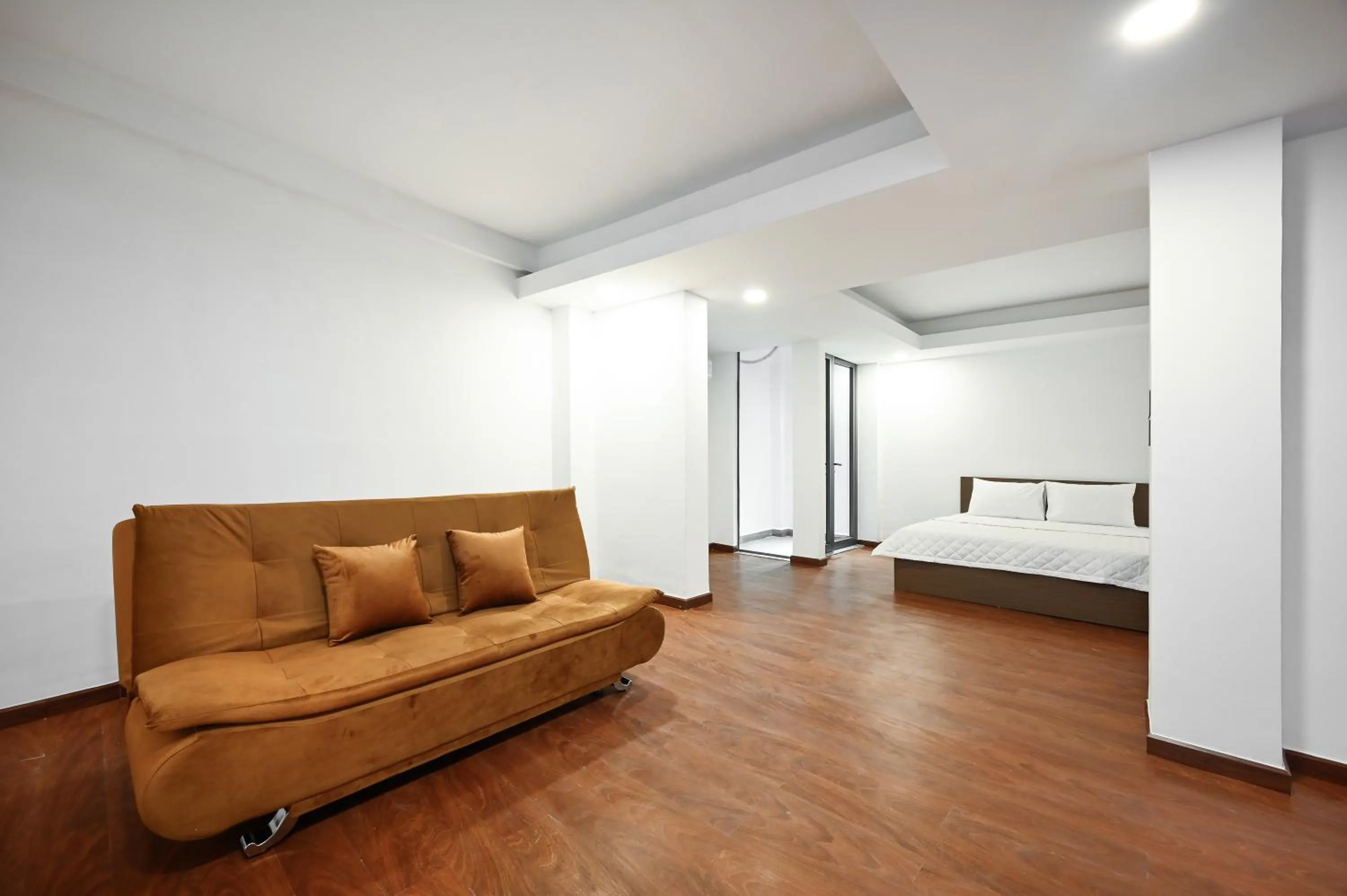 Bed in YoKo Airport Saigon Hotel