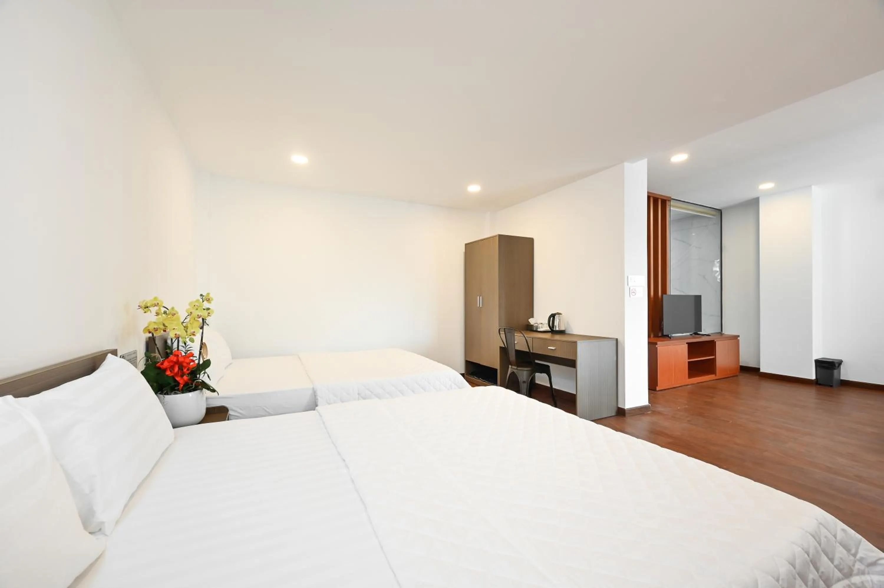 Bed in YoKo Airport Saigon Hotel