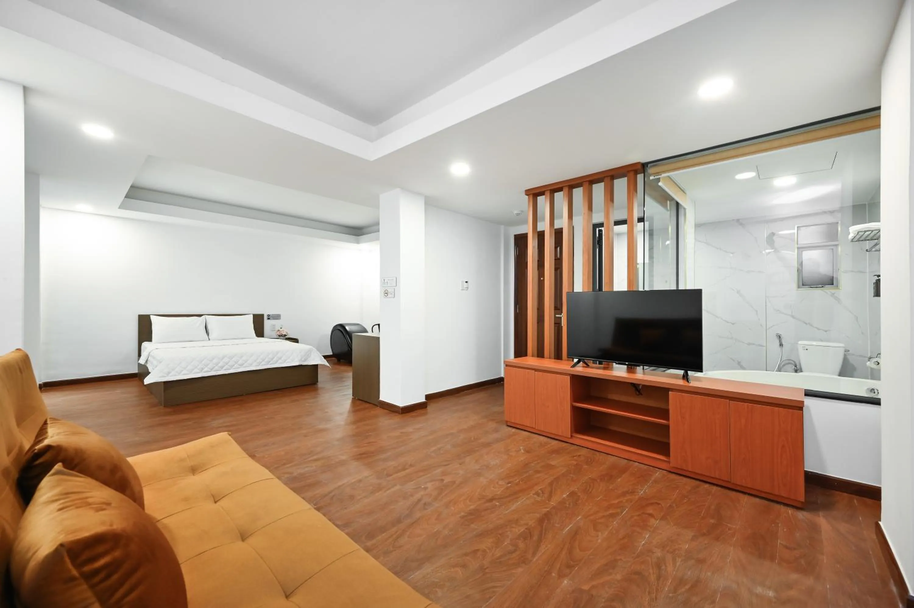 TV and multimedia, Bed in YoKo Airport Saigon Hotel