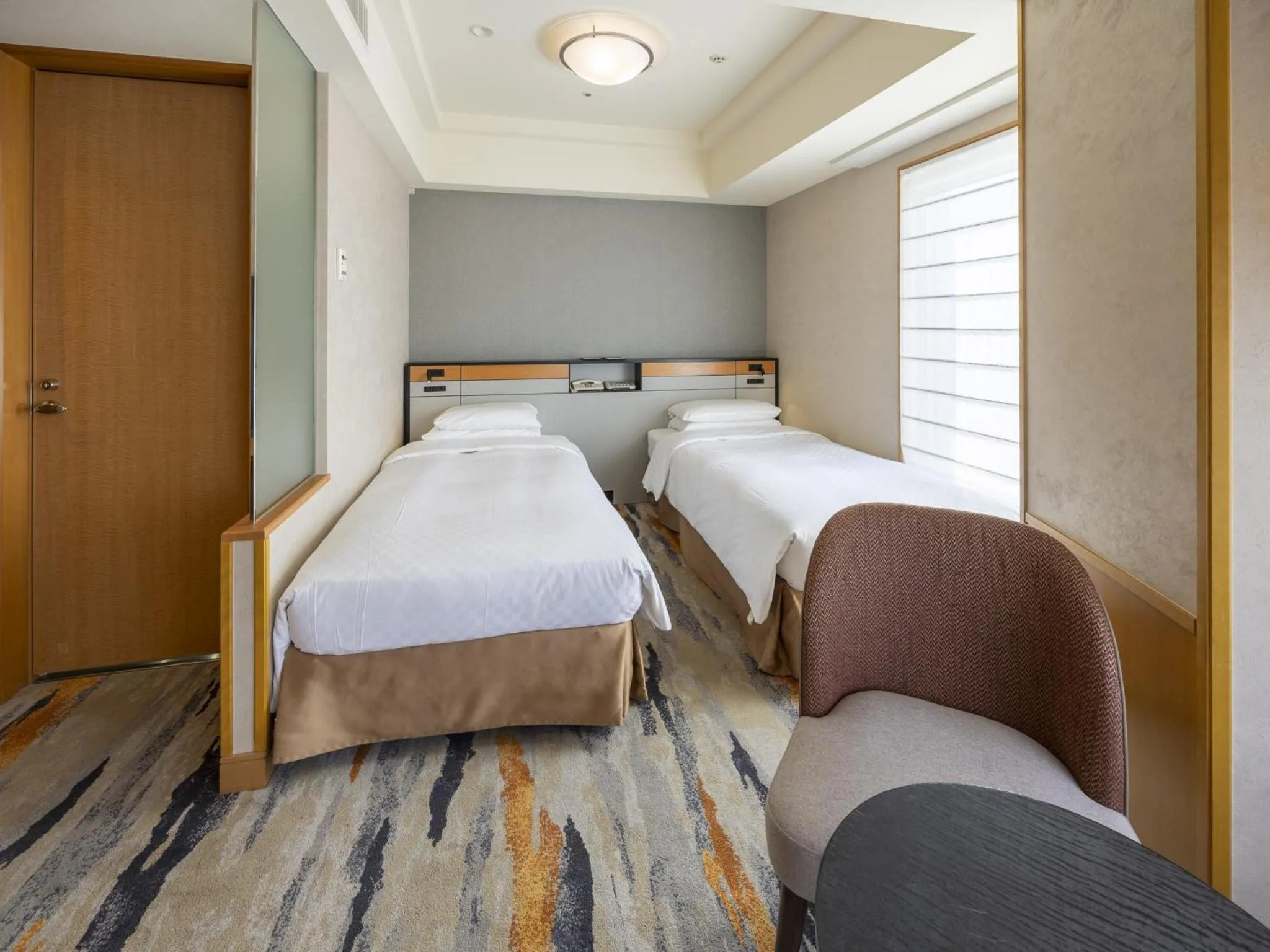 Bed in JR Hotel Clement Takamatsu