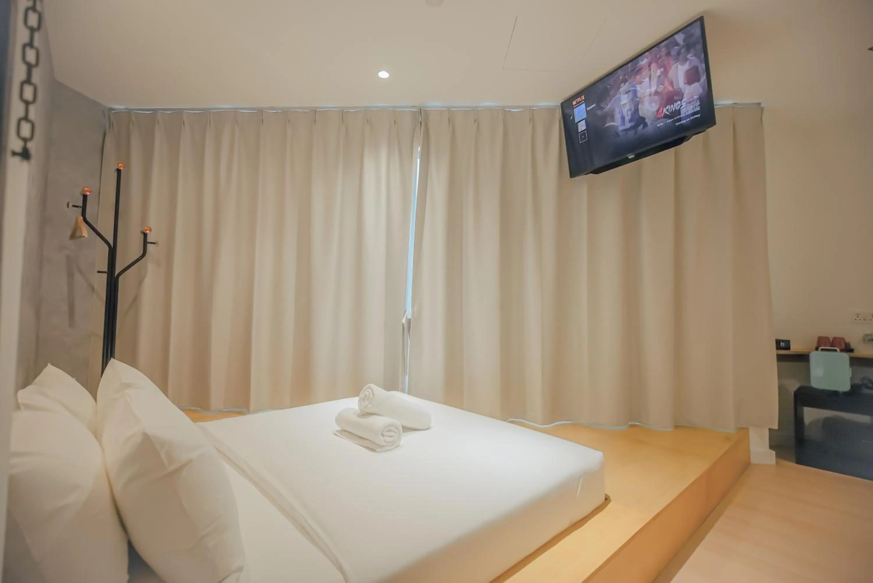 Bed in Double H Boutique Hotel