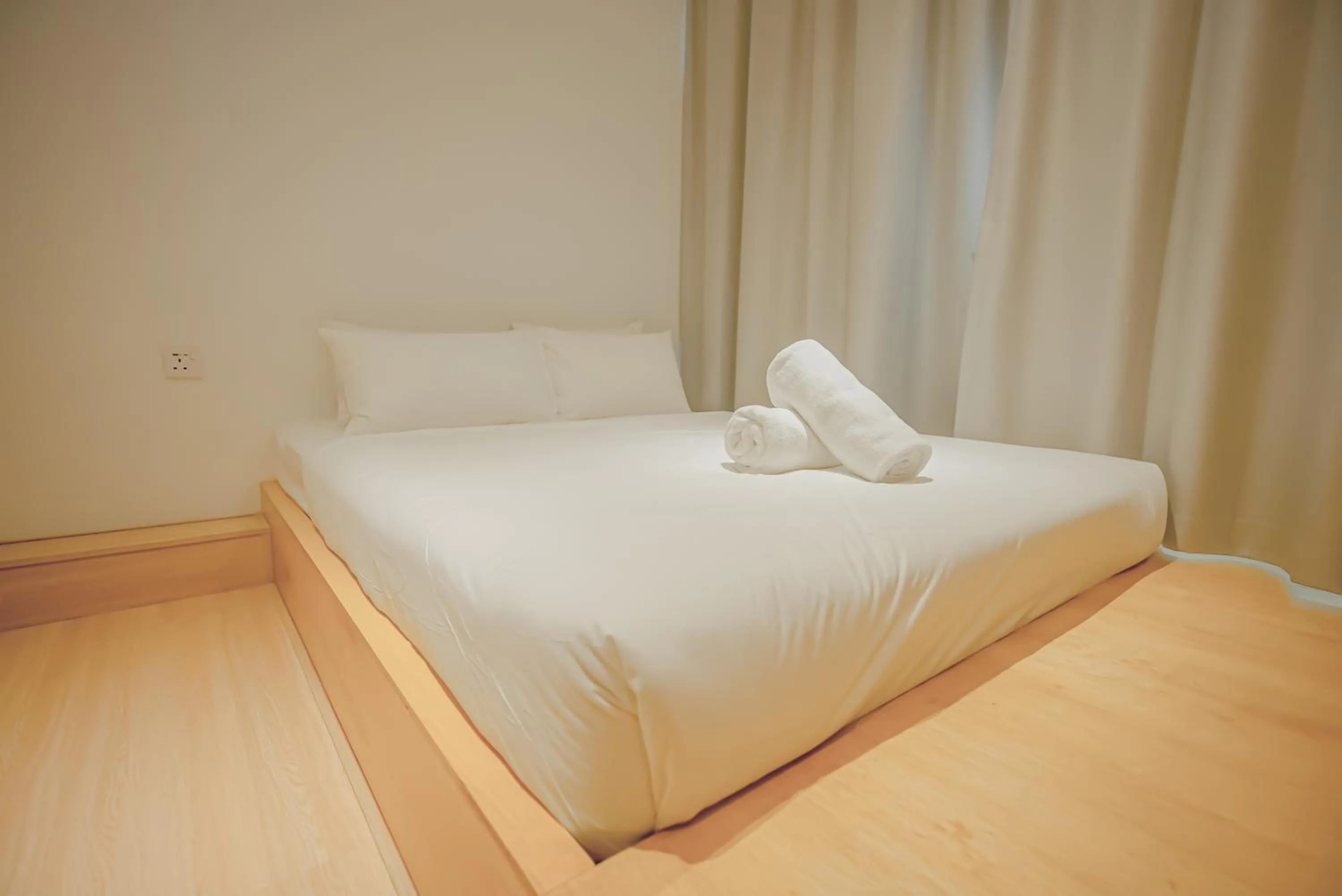 Bed in Double H Boutique Hotel