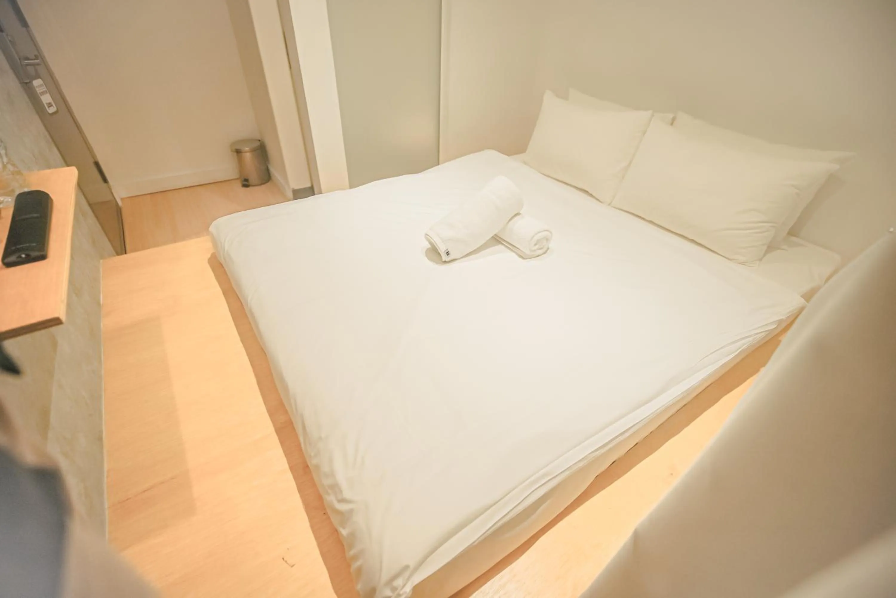 Bed in Double H Boutique Hotel