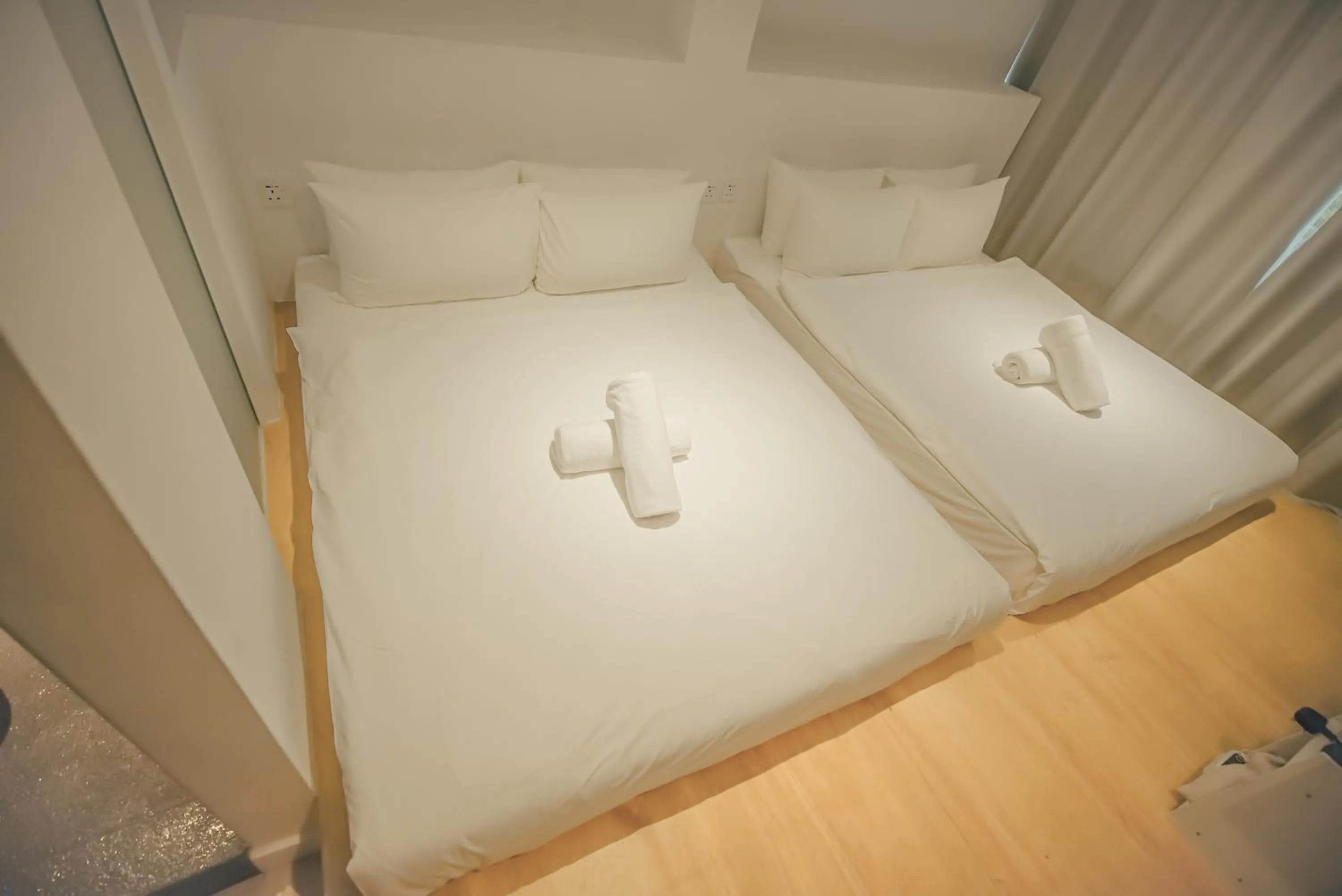 Bed in Double H Boutique Hotel