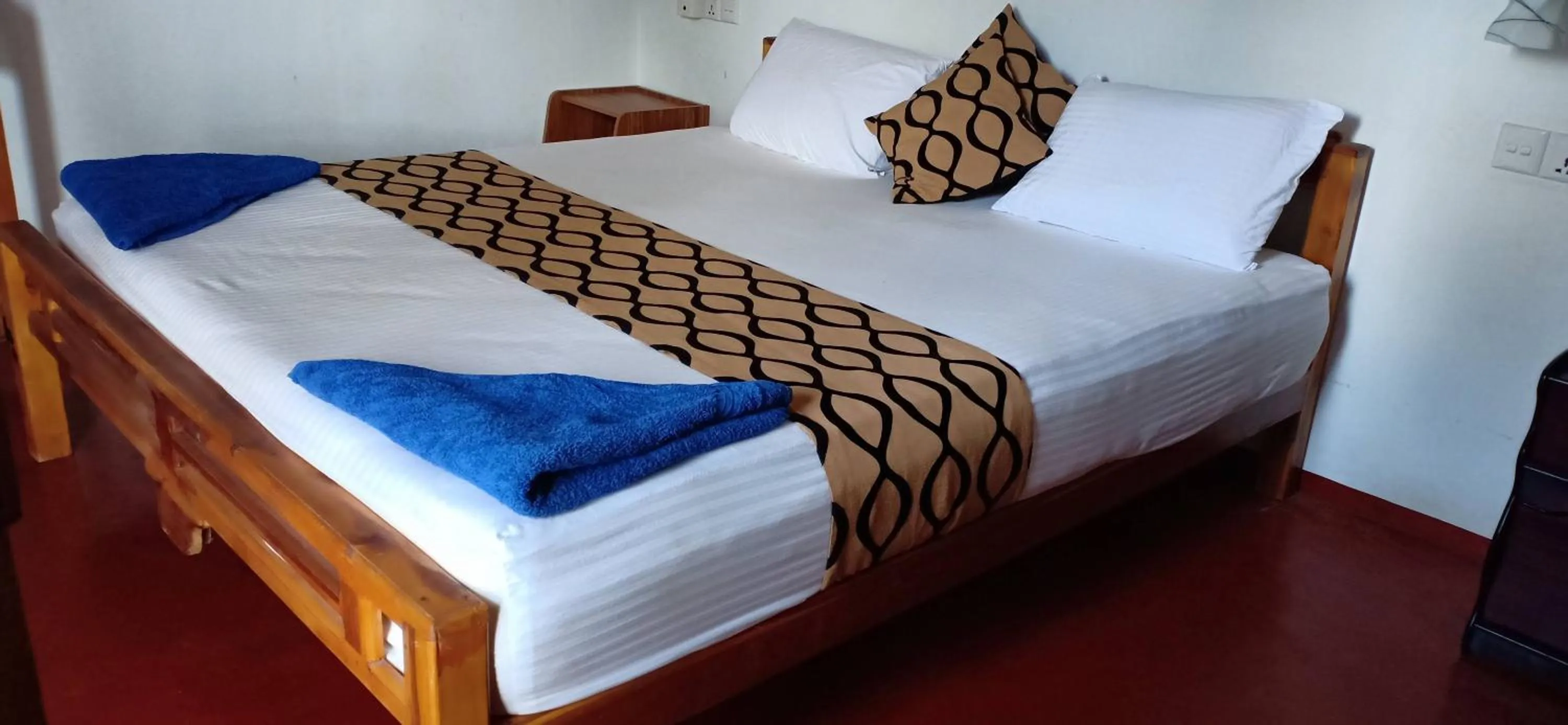 Bed in SURF & SAND Hotel Arugambay