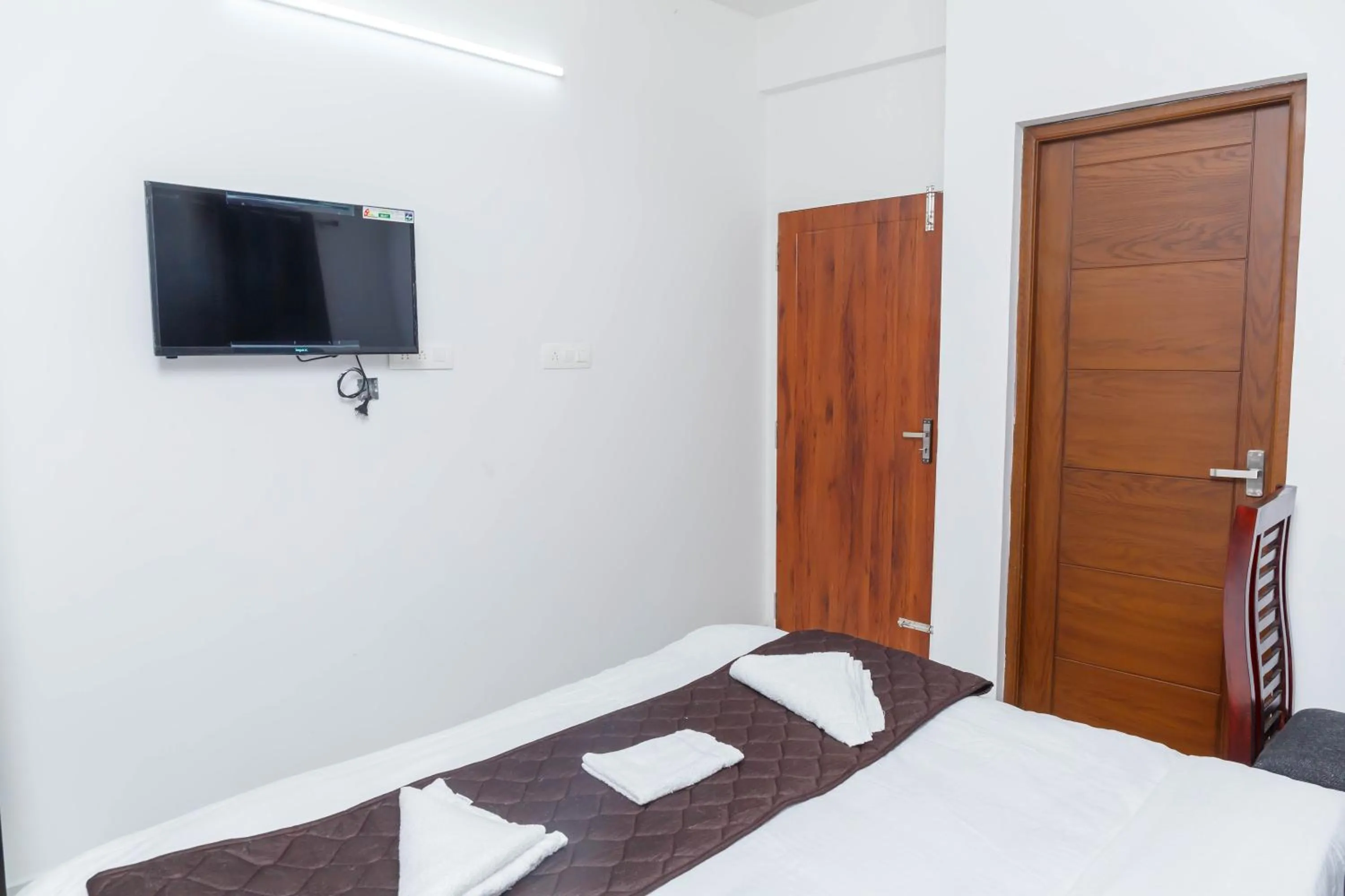 Bed in Guest West Inn Cochin