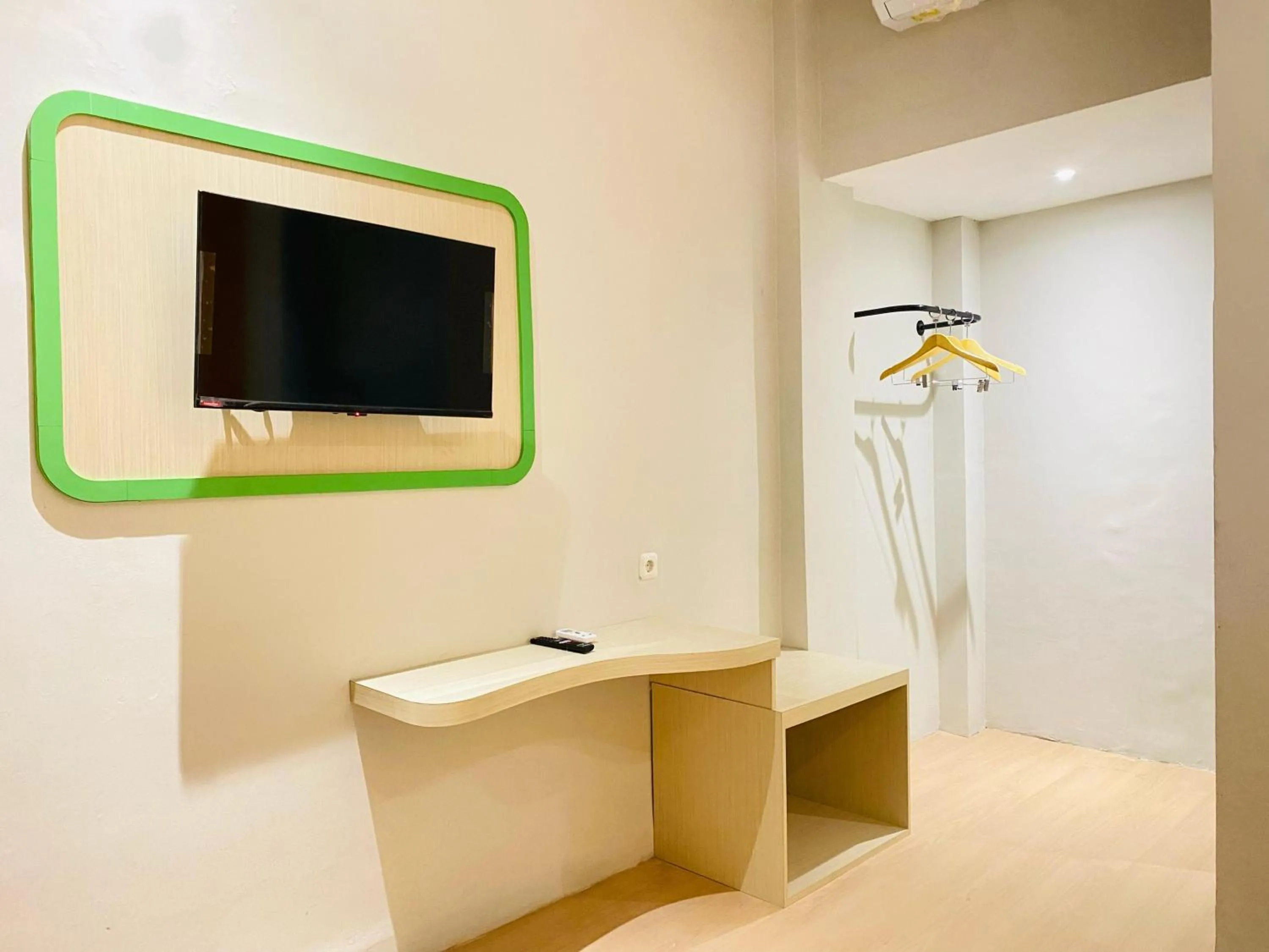 TV and multimedia in Ruma Ruma Hotel Kenten - Palembang