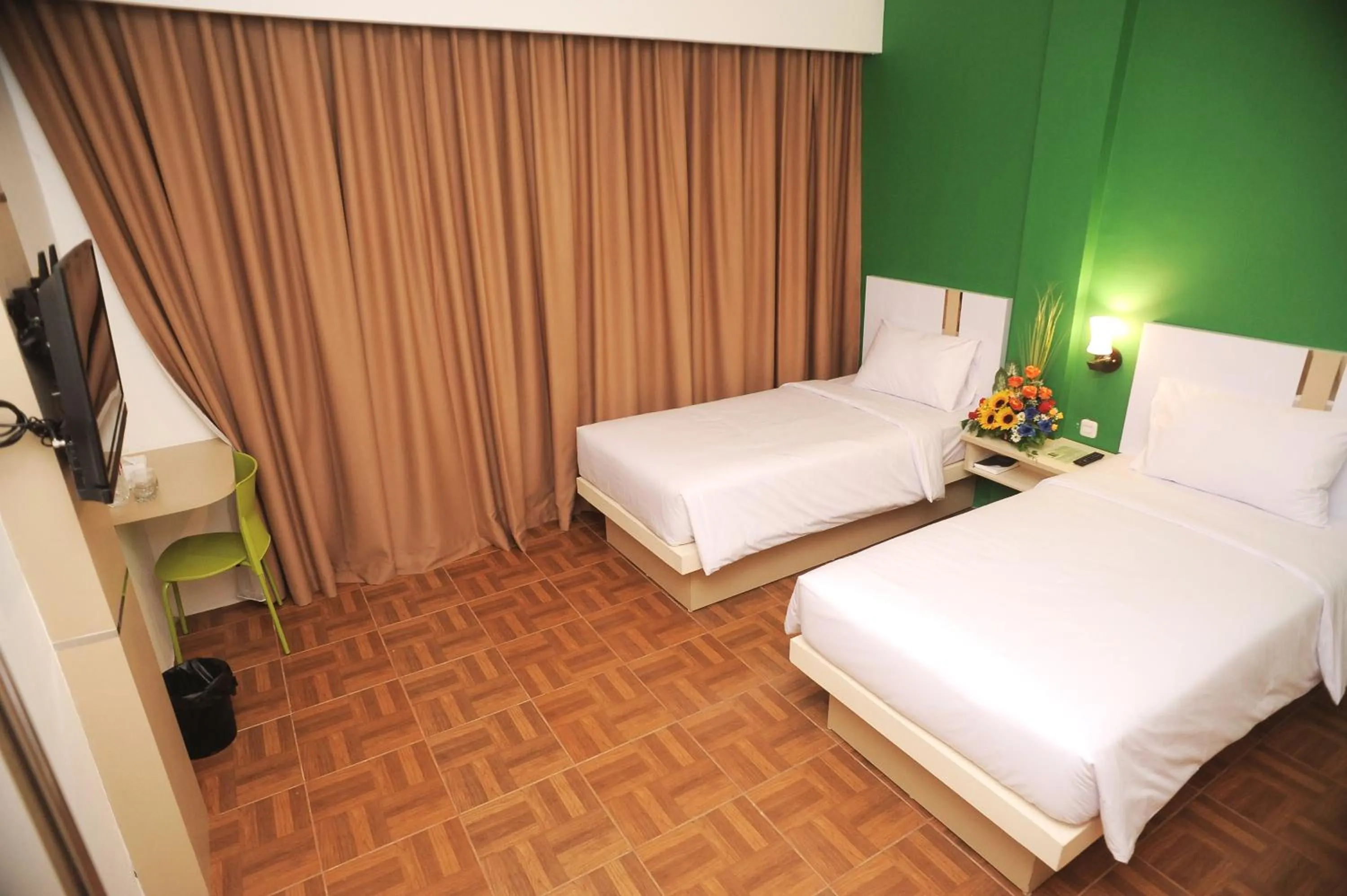 Photo of the whole room, Bed in Ruma Ruma Hotel Kenten - Palembang