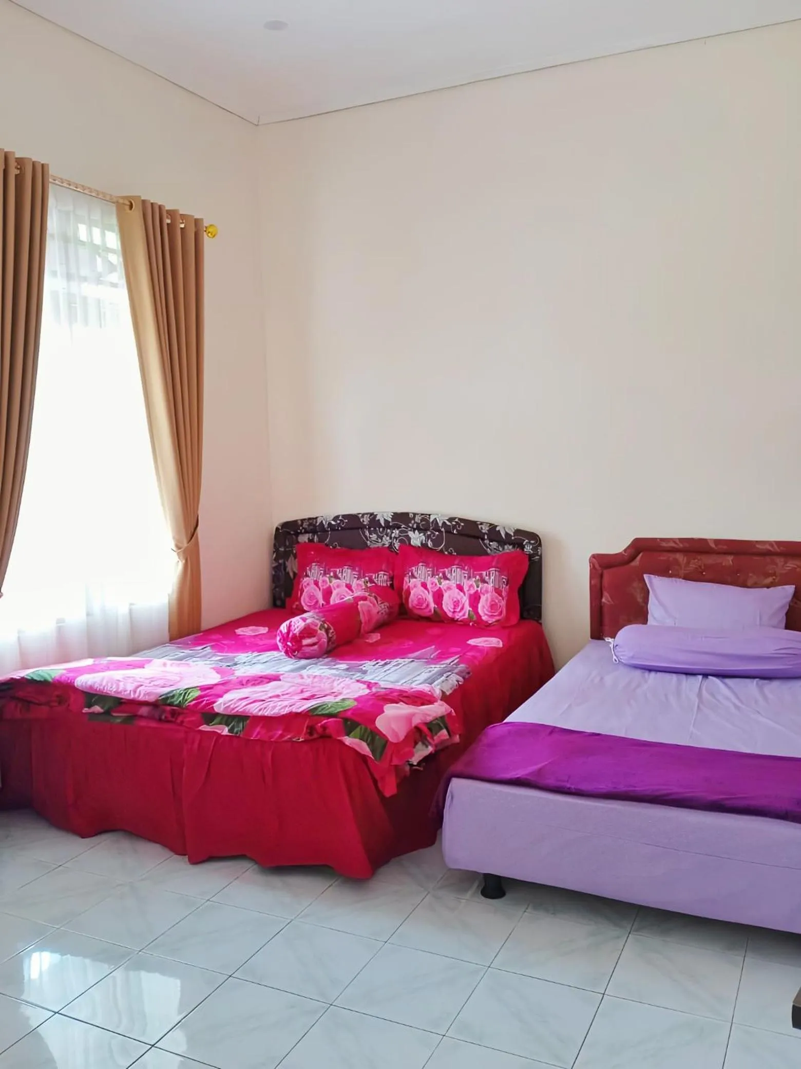 Bed in Penginapan Prambanan TRISAN