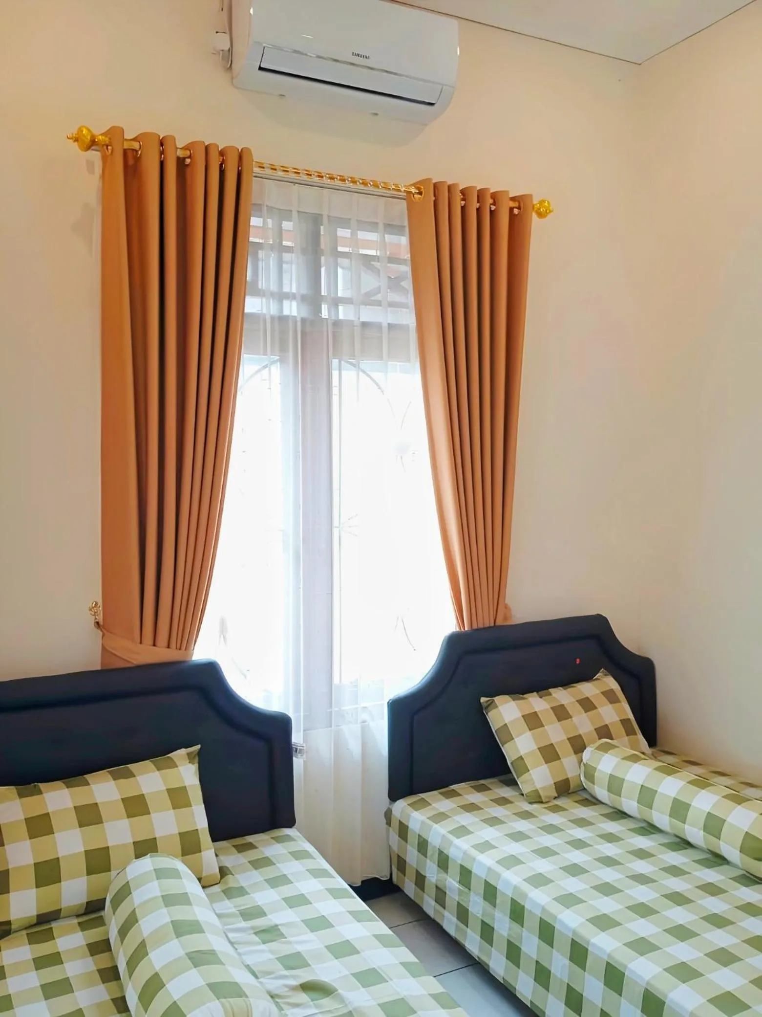 Bed in Penginapan Prambanan TRISAN