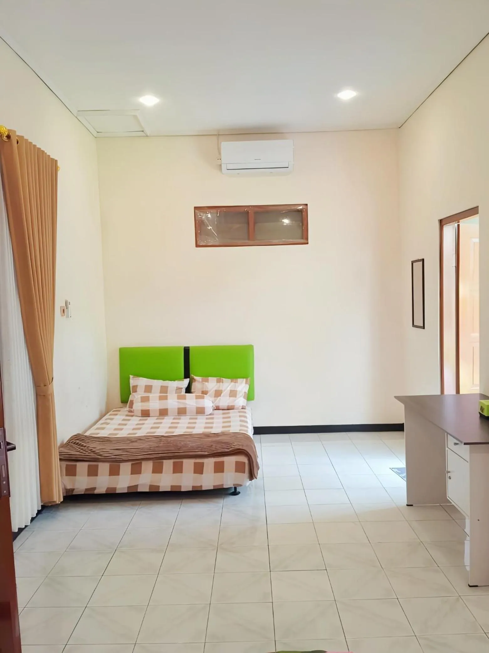 Bed in Penginapan Prambanan TRISAN