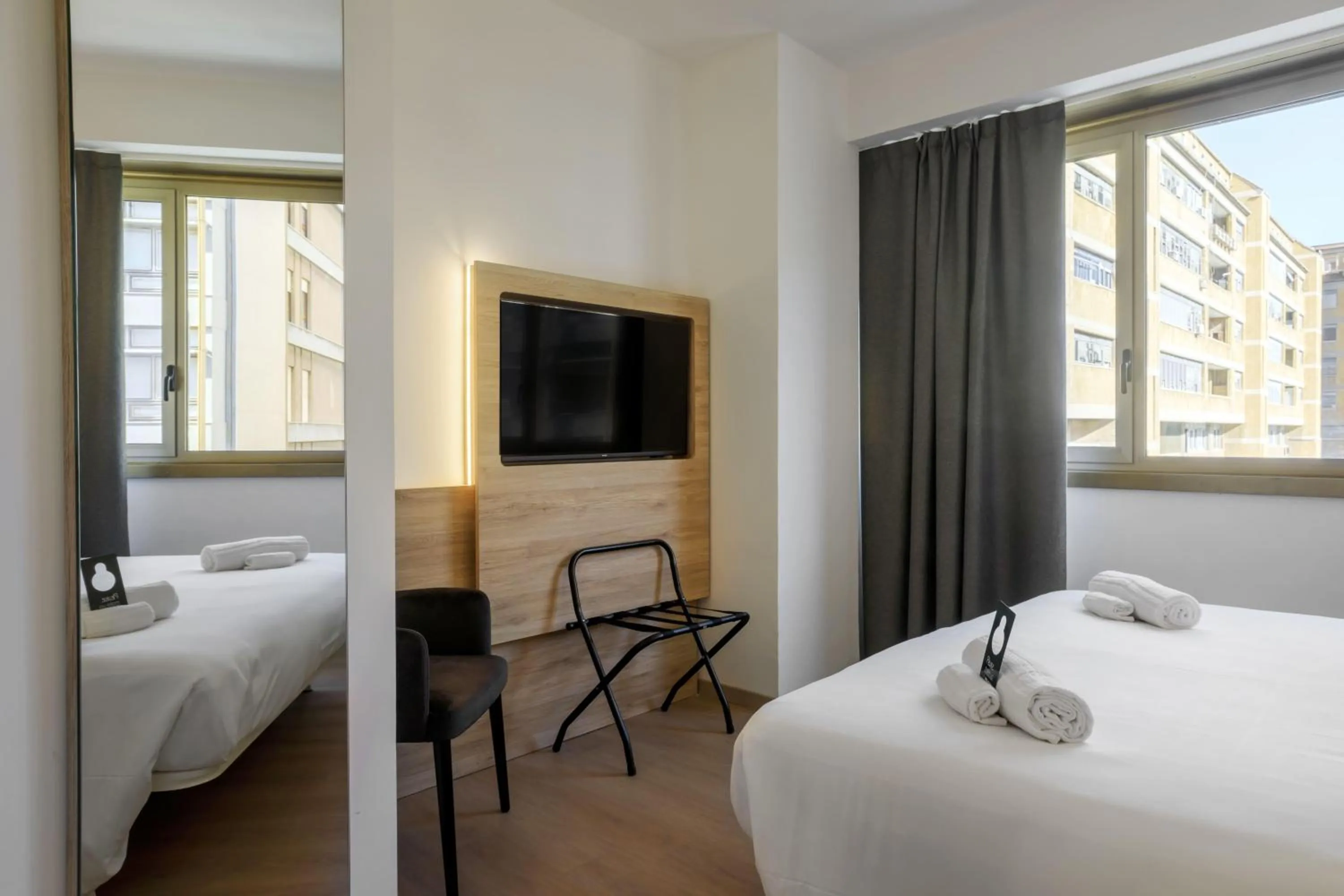 Photo of the whole room, Bed in B&B HOTEL Catania City Center