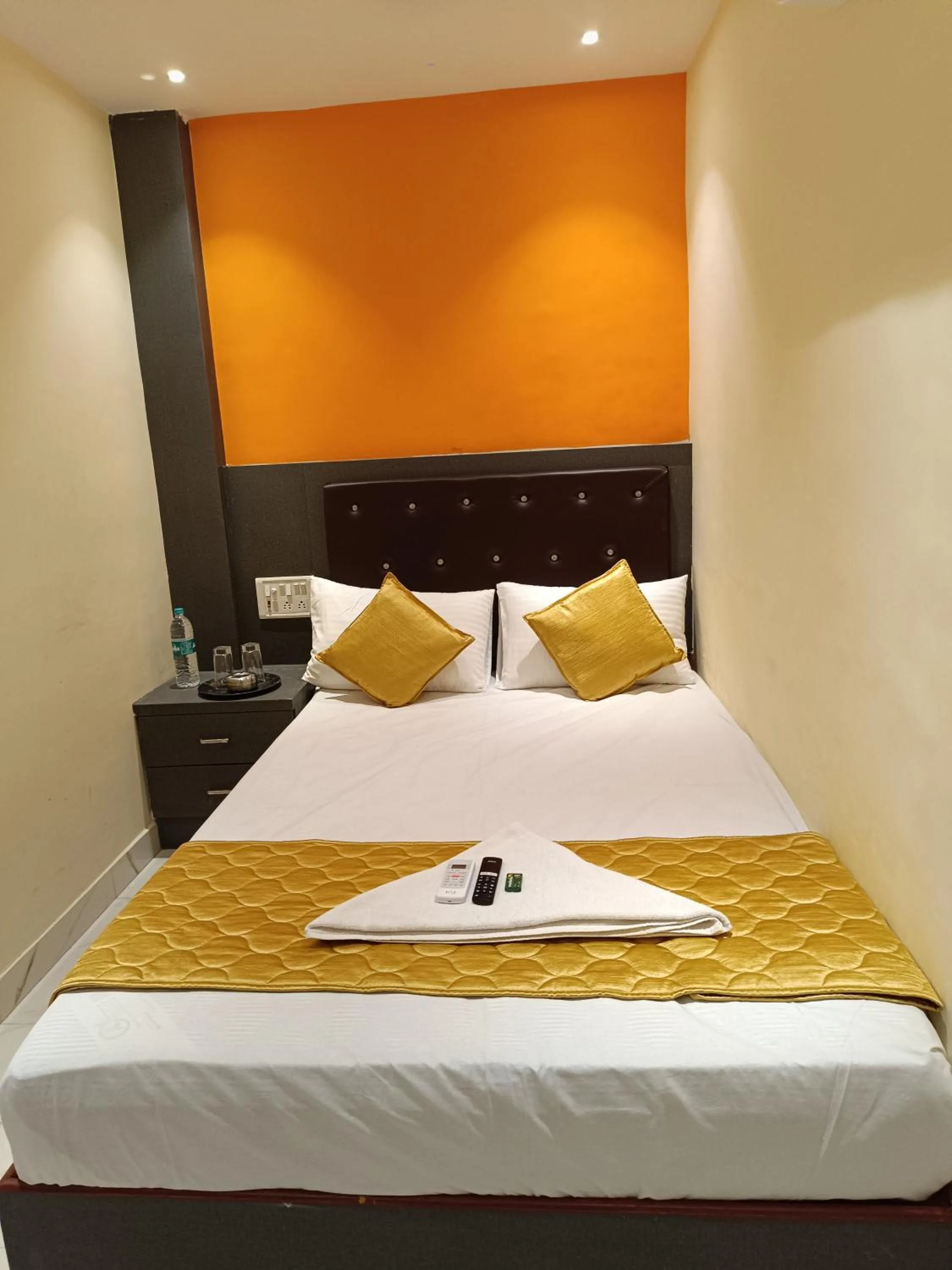 Bed in Hotel Powai Residency