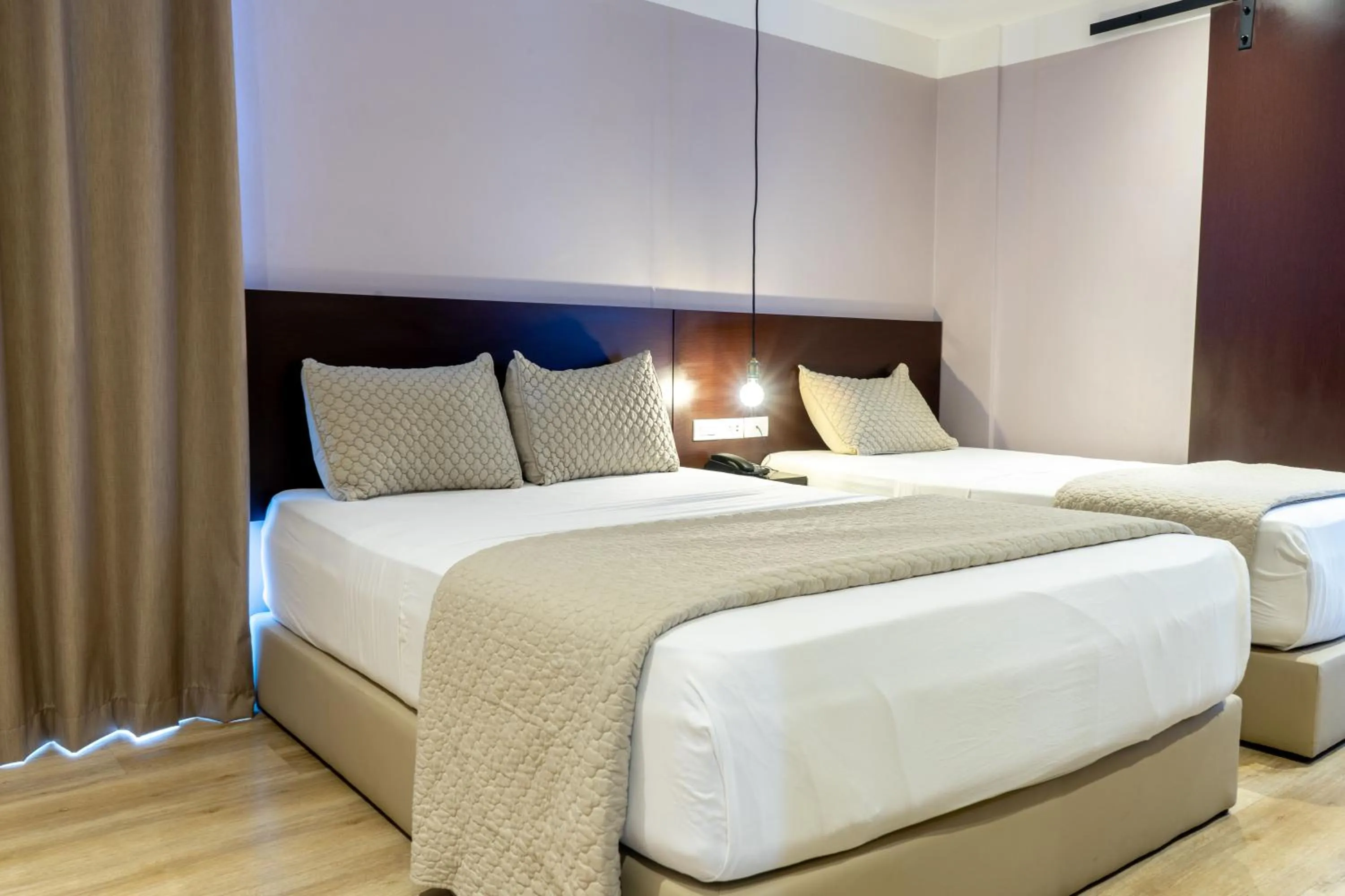 Bed in Hotel Grand Galaxie