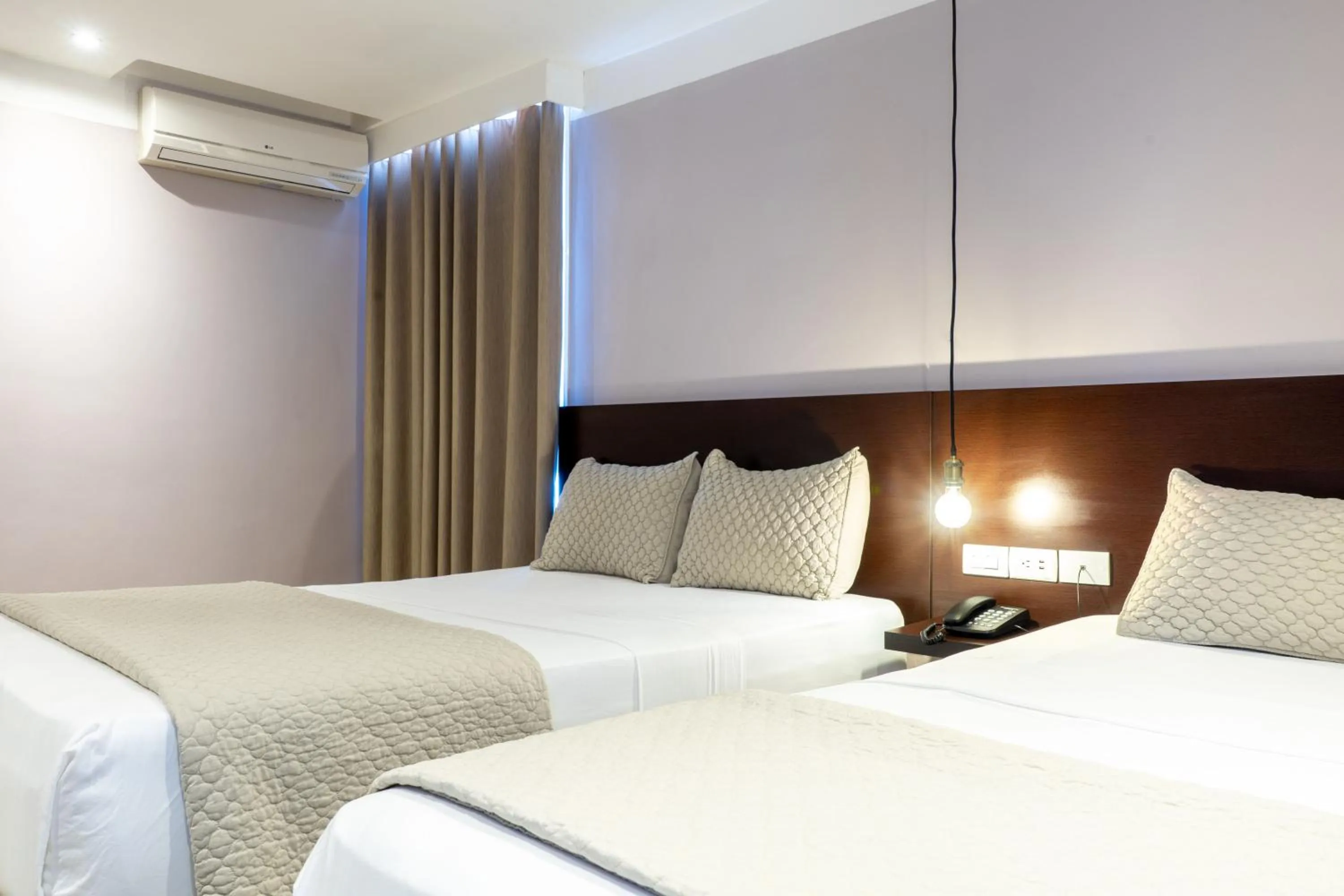 Bed in Hotel Grand Galaxie