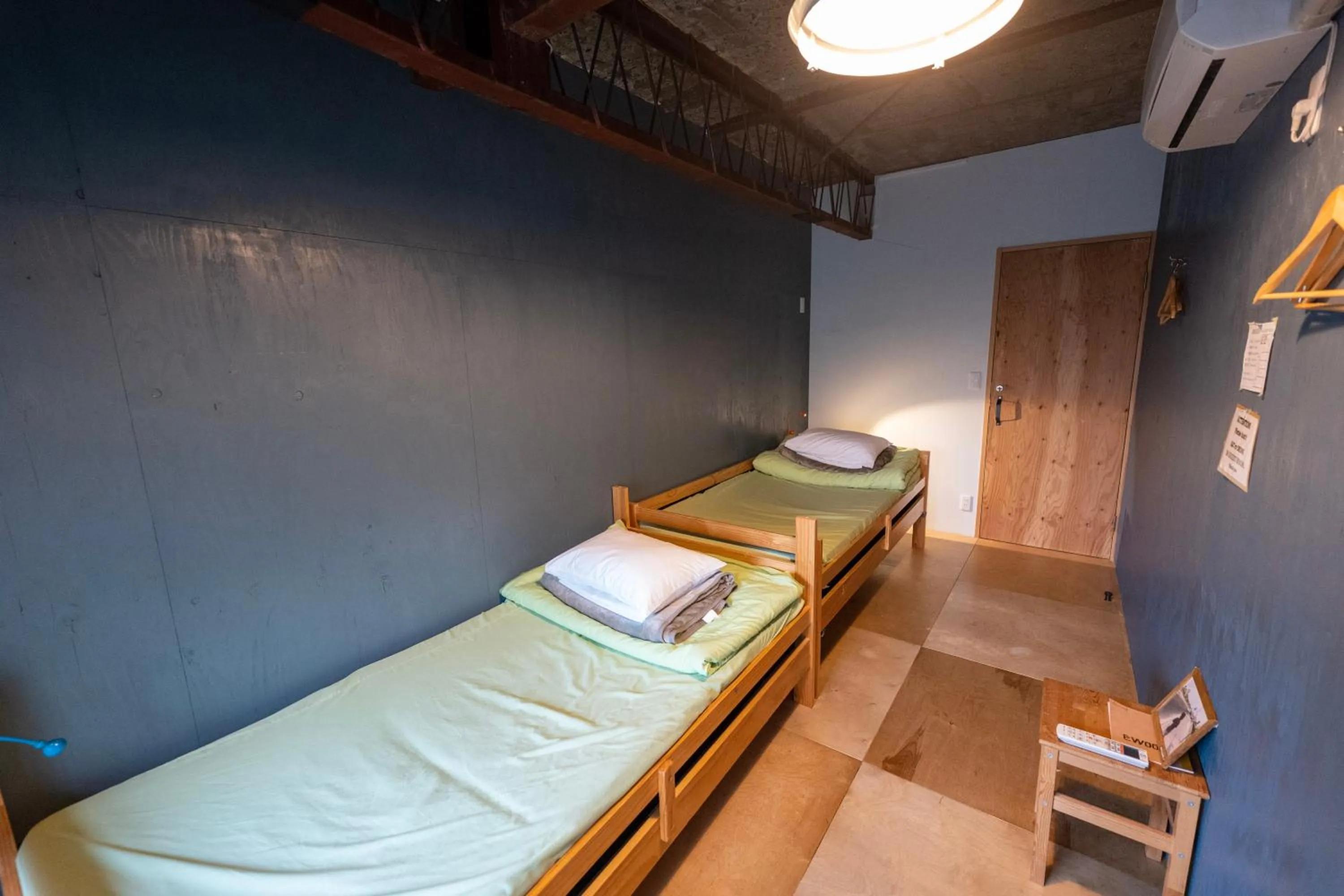 Bed in Kamp Houkan-cho Backpacker's Inn & Lounge